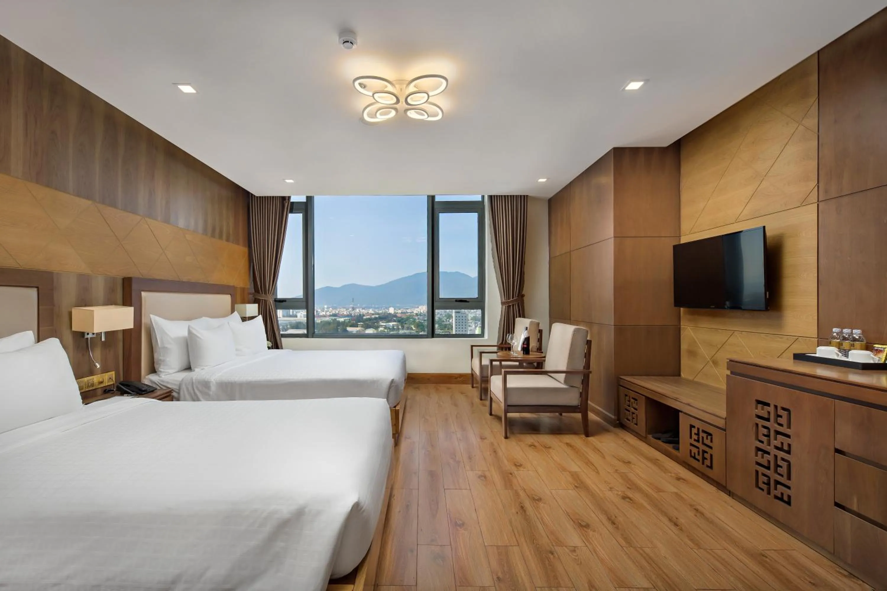 Bed in Nhu Minh Plaza Danang Hotel