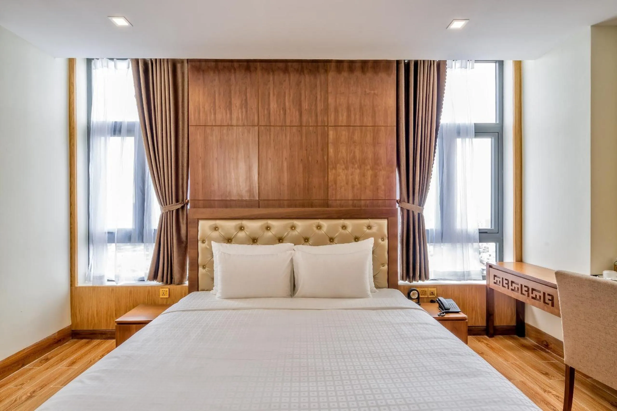 Bed in Nhu Minh Plaza Danang Hotel