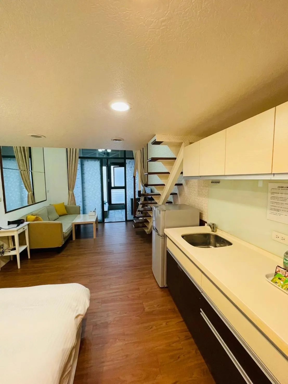 Bed in Chiuan Jia Hot Spring House