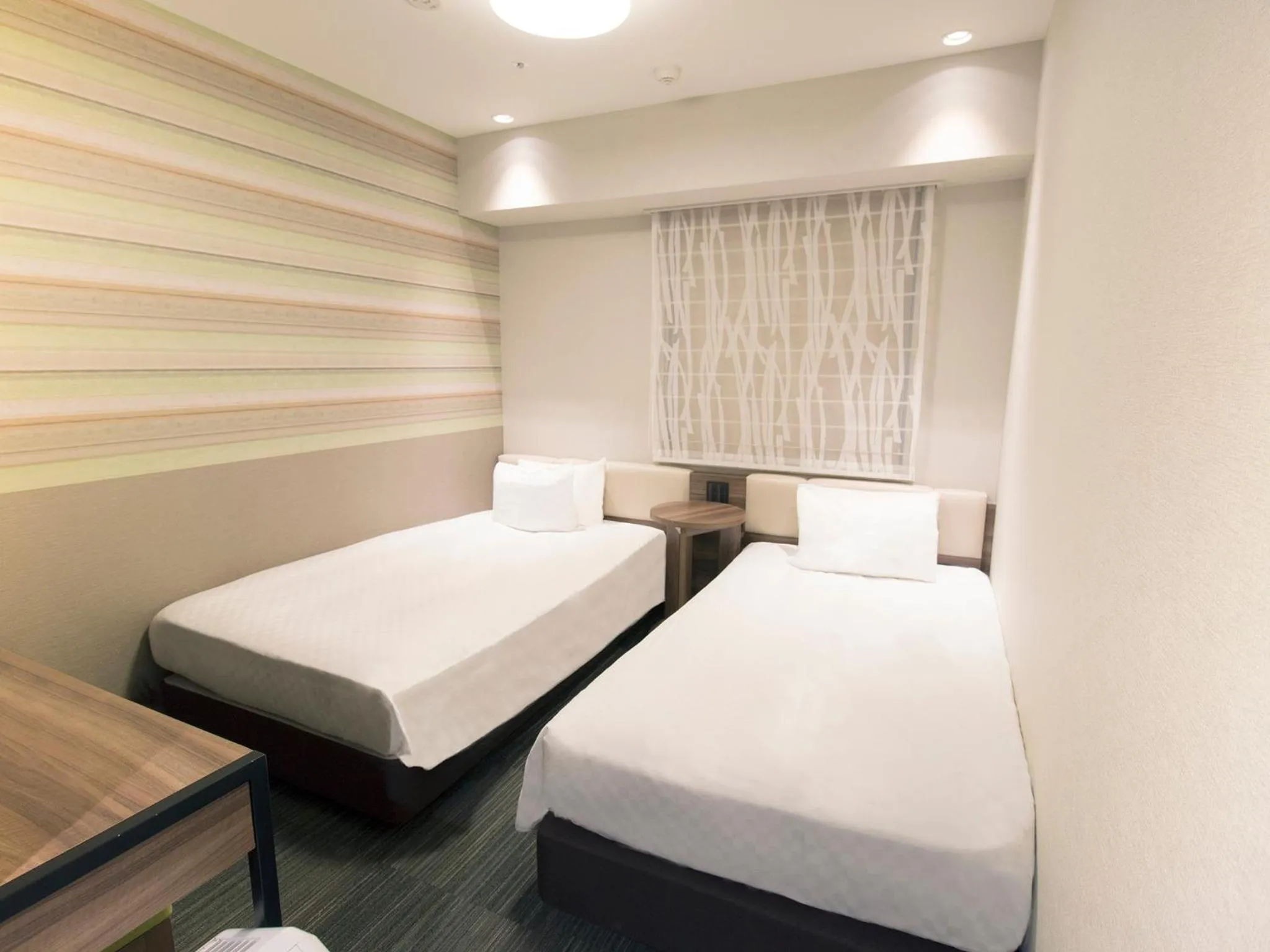 Photo of the whole room, Bed in Hearton Hotel Shinsaibashi Nagahoridouri