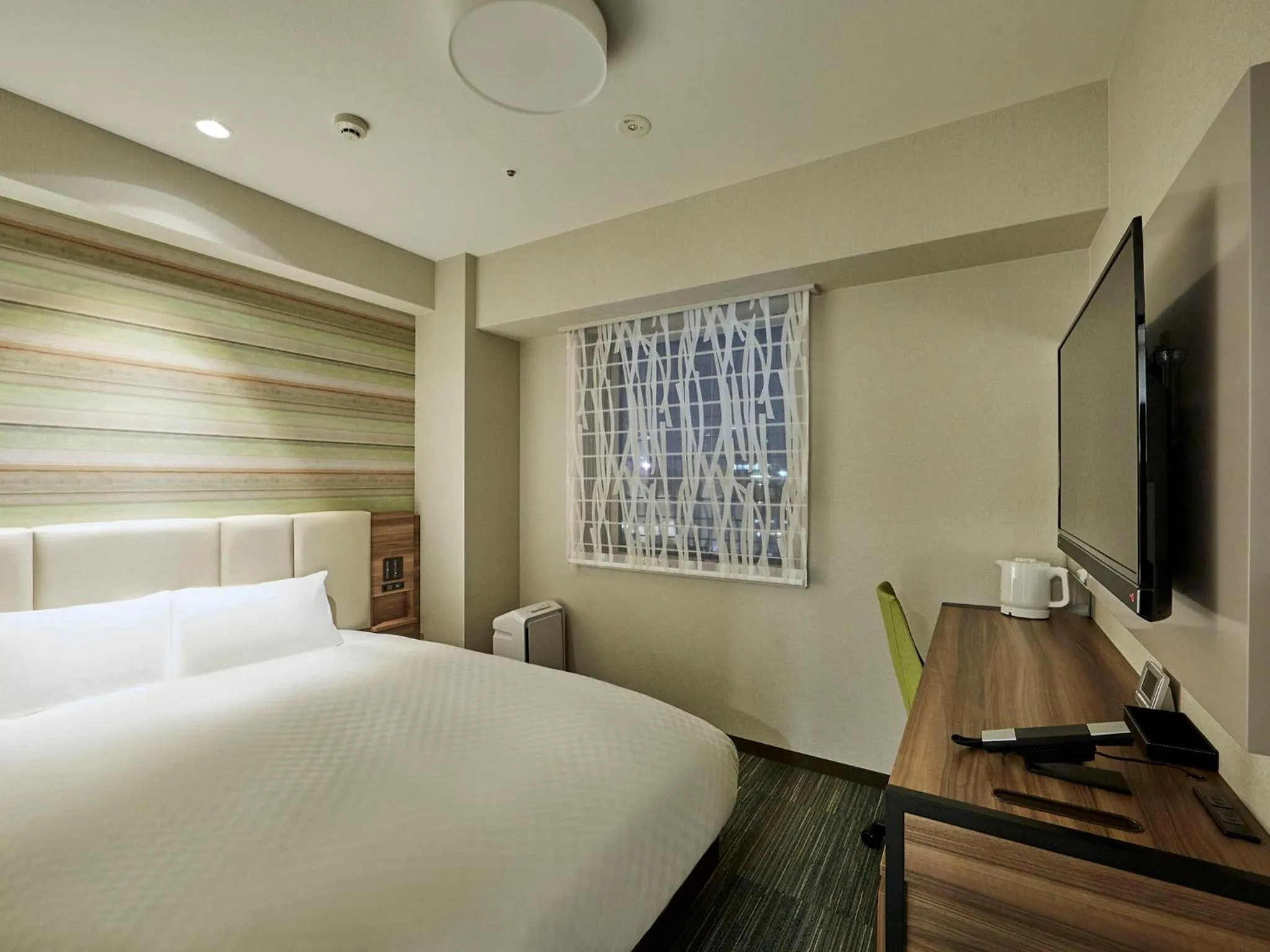 Photo of the whole room, Bed in Hearton Hotel Shinsaibashi Nagahoridouri