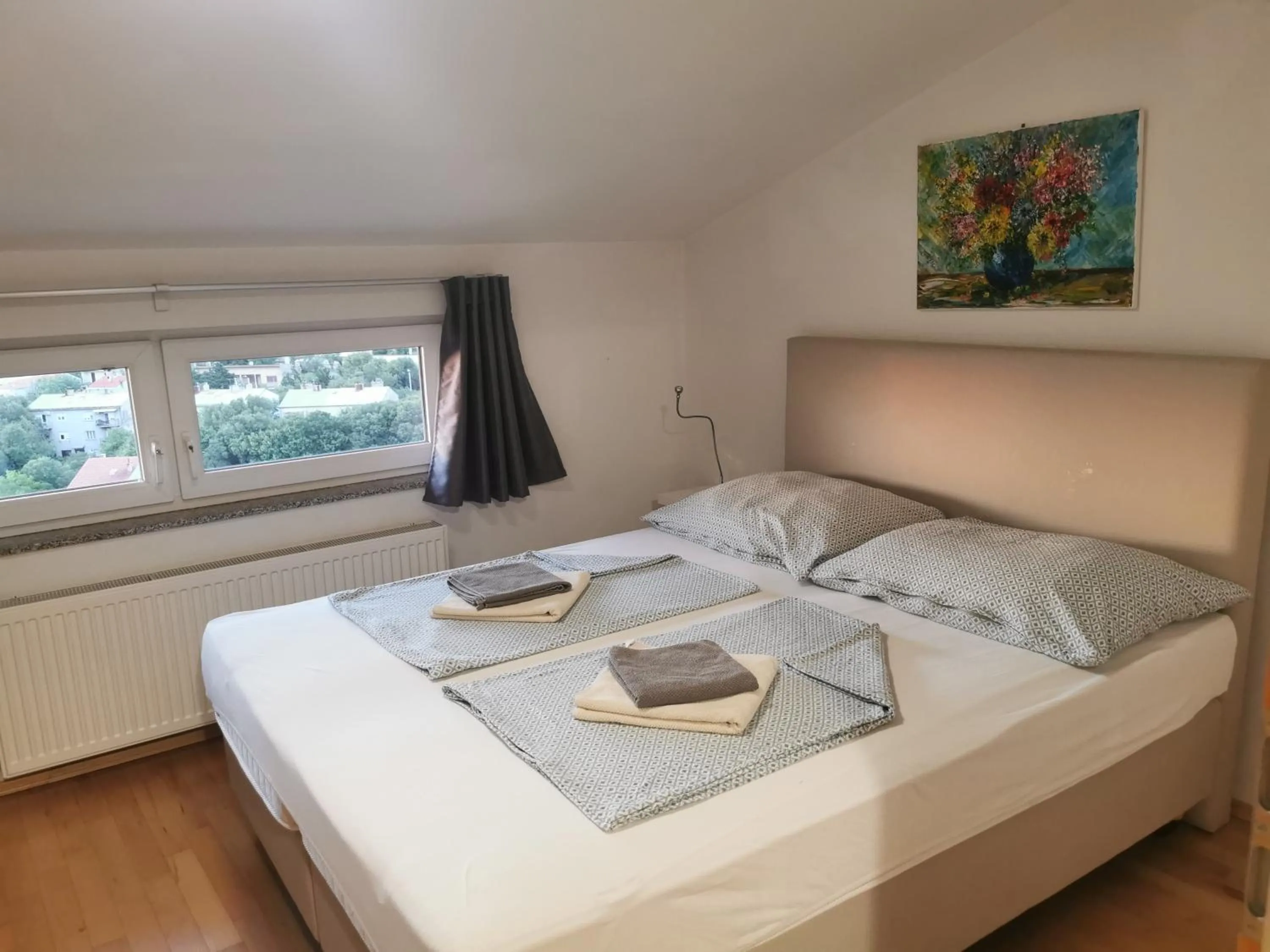 Bed in BC Better Choice Apartments with Central Heating