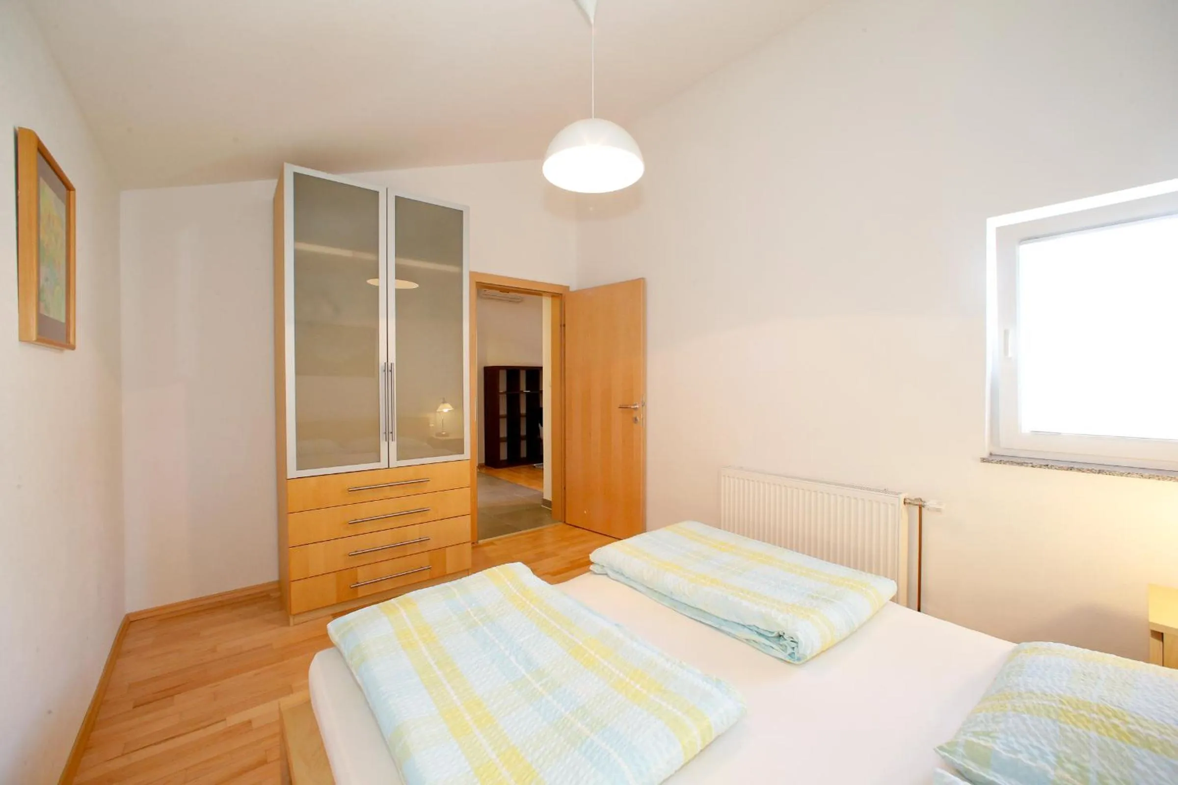 Bed in BC Better Choice Apartments with Central Heating