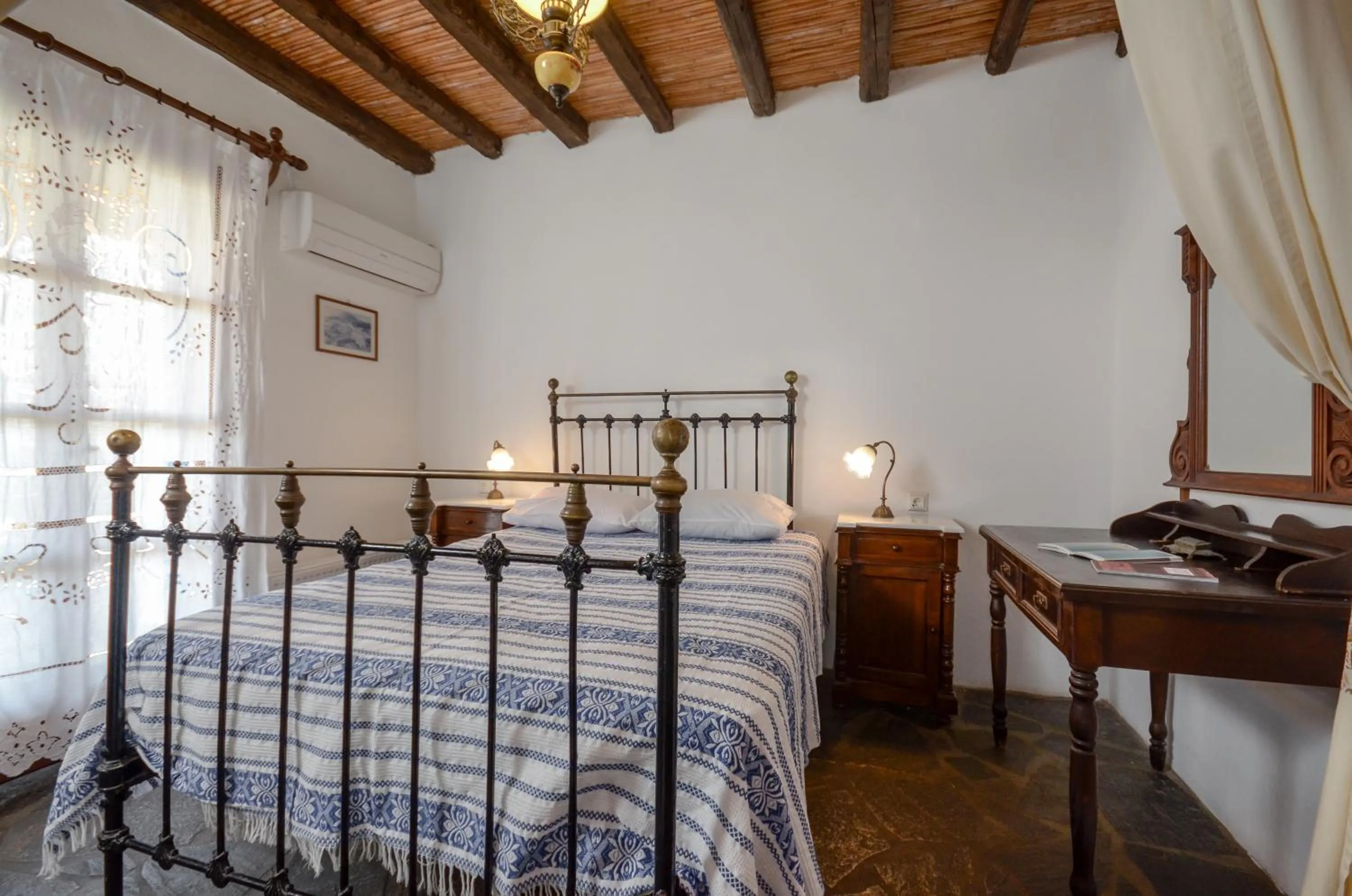 Bed in Naxos Filoxenia Hotel