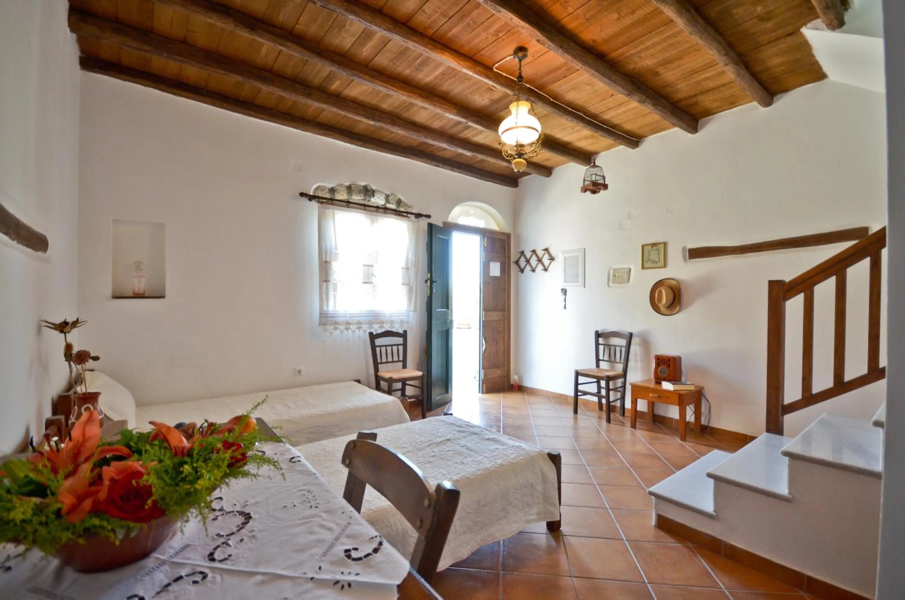 Living room, Bed in Naxos Filoxenia Hotel
