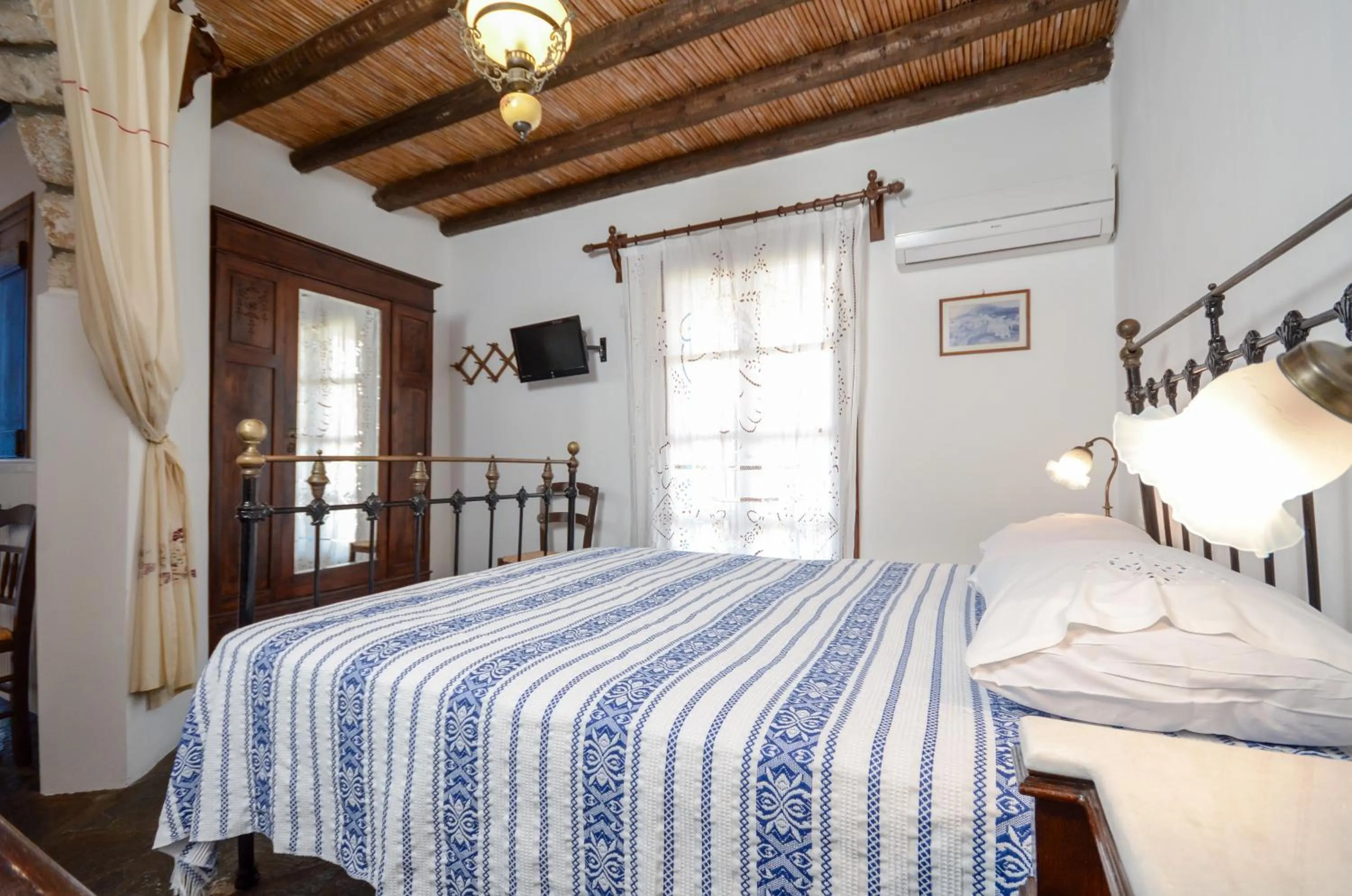 Bed in Naxos Filoxenia Hotel