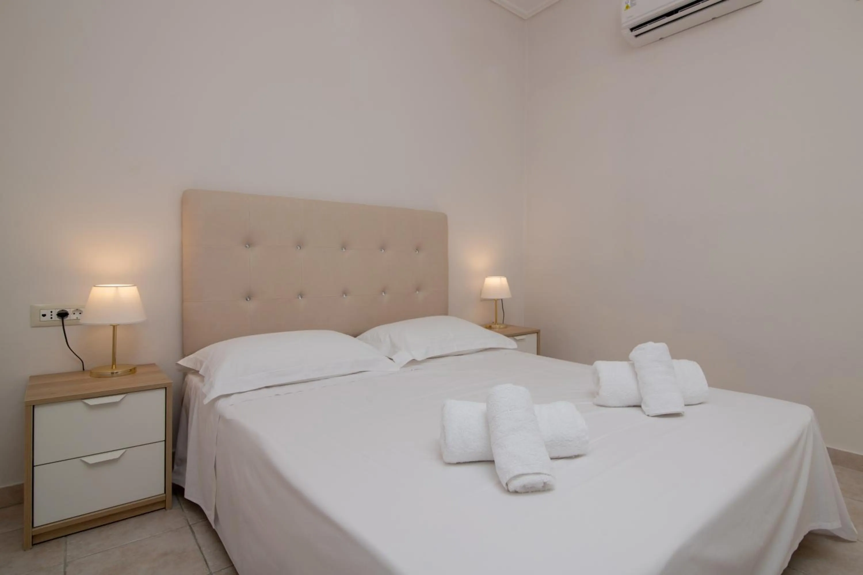 Bed in Edelweiss Hotel