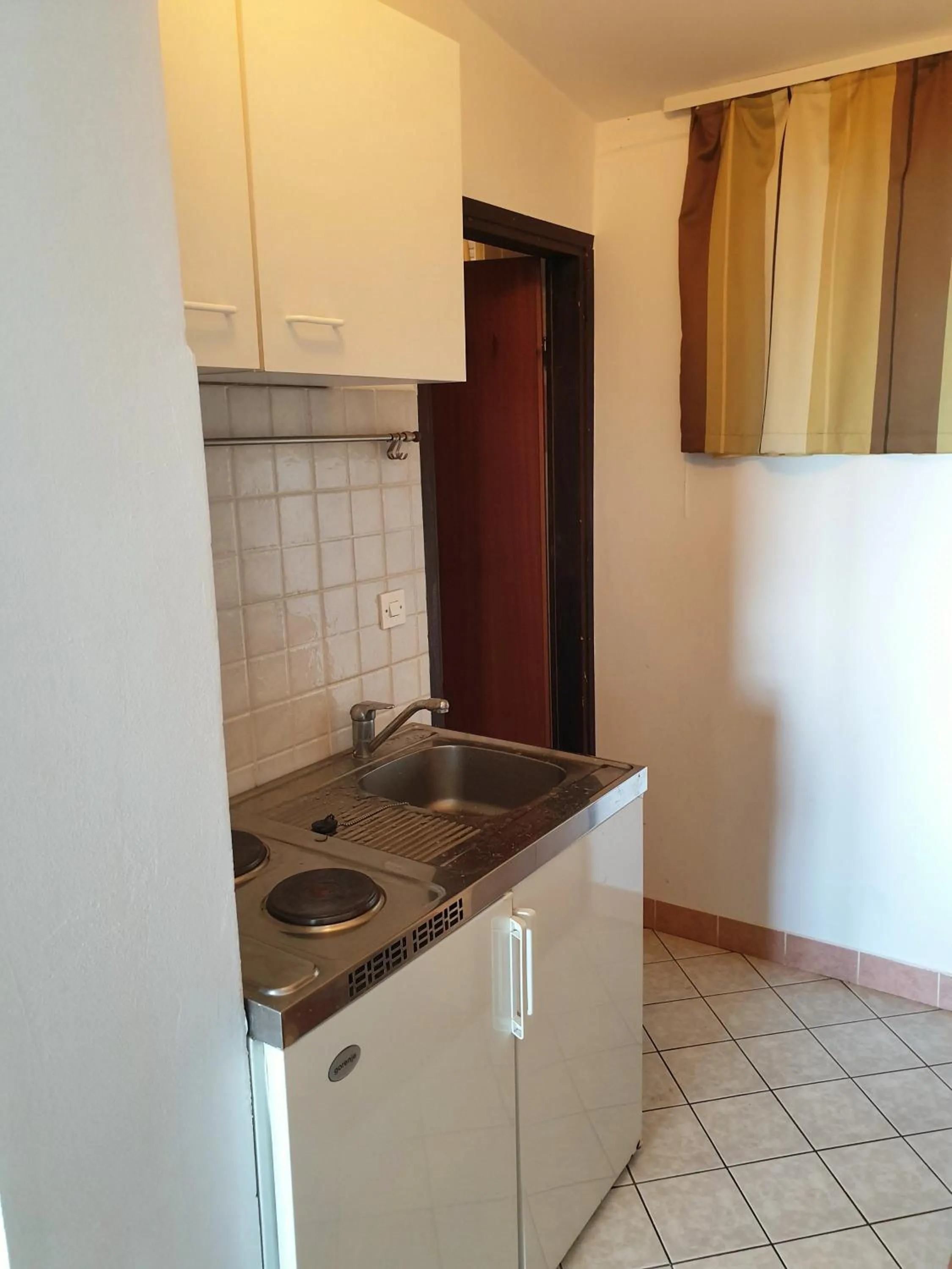 Kitchen or kitchenette in Family Bungalow Pineta