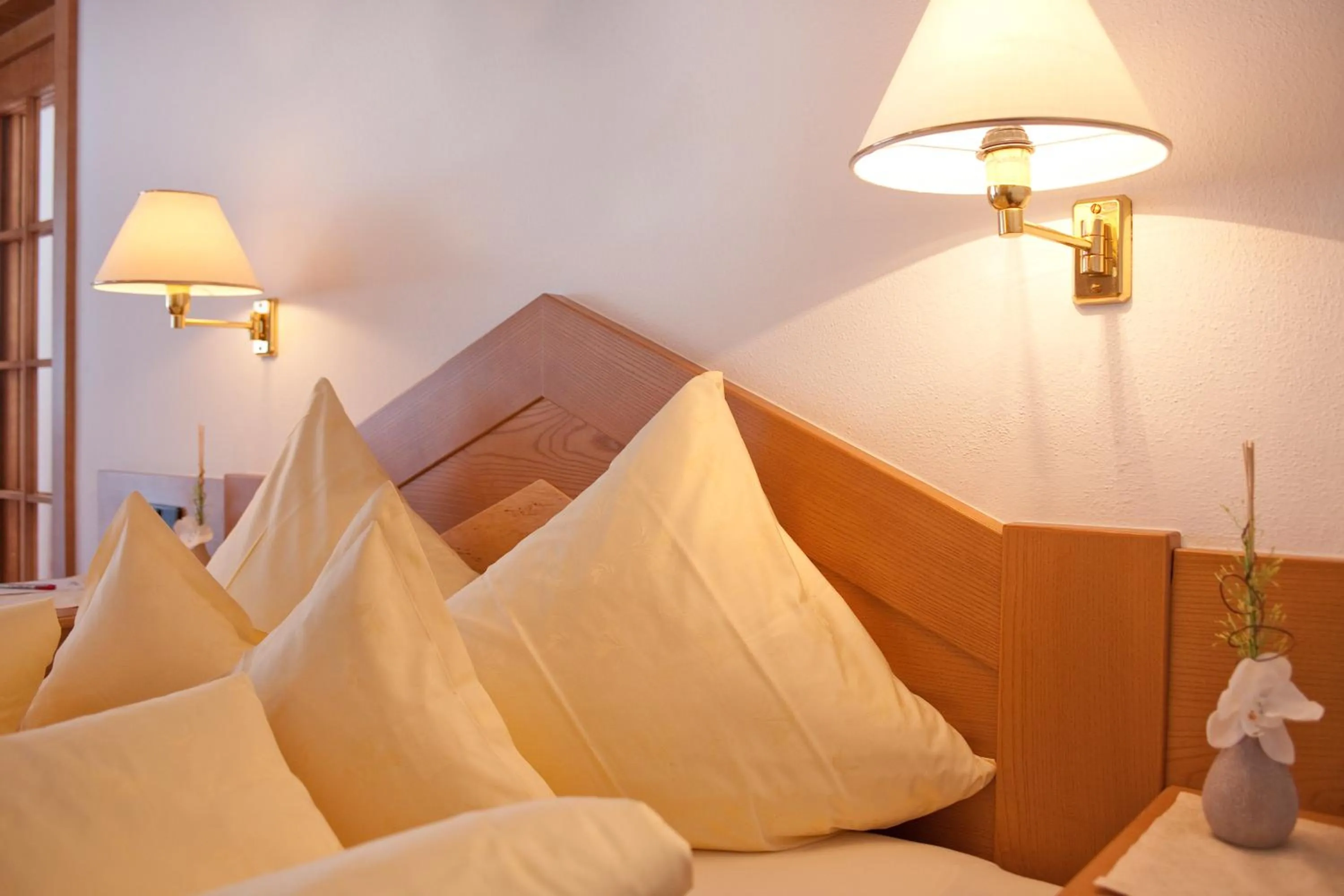 Bed in Hotel Jagdhof Bed & Breakfast