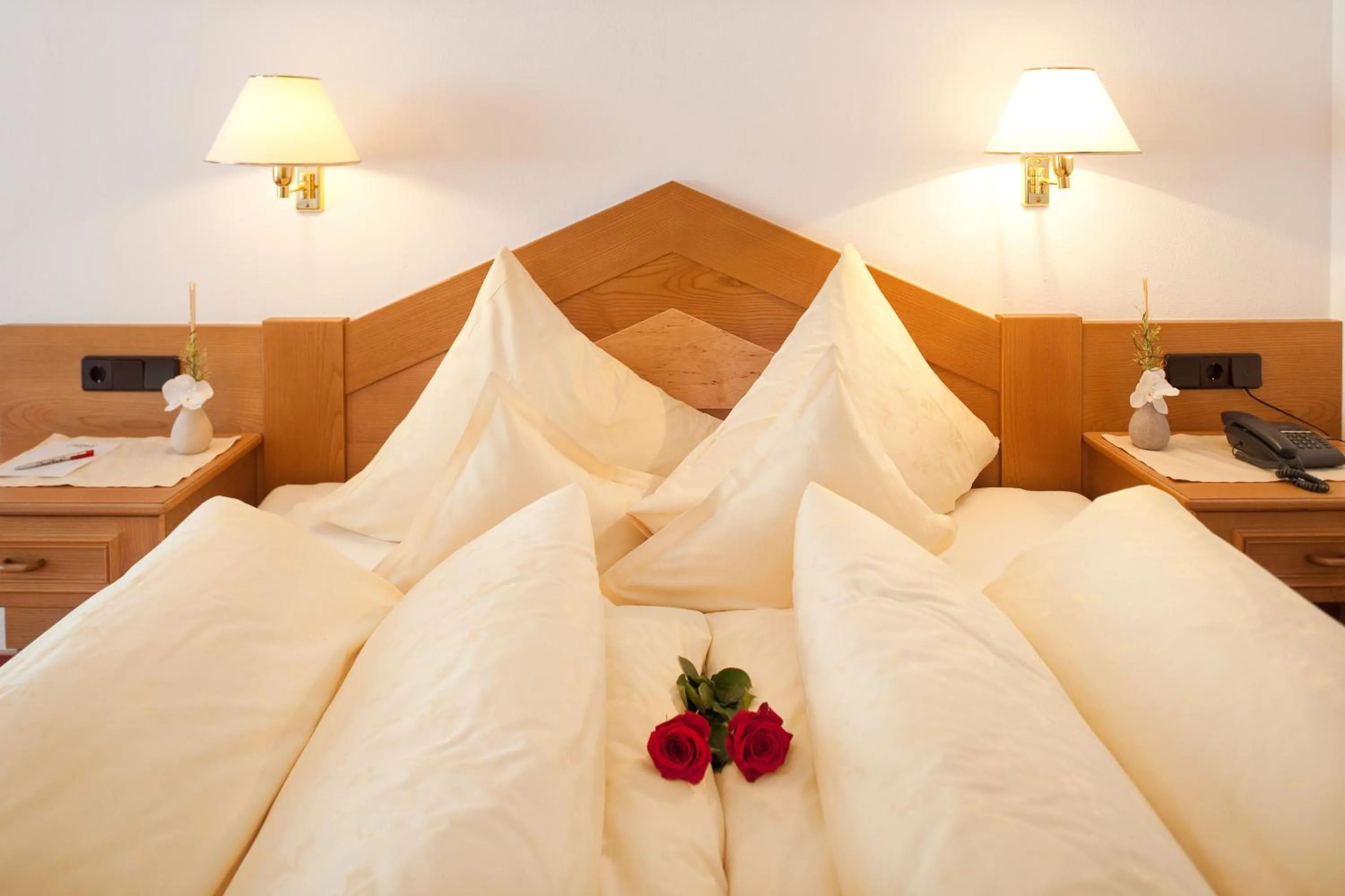 Bed in Hotel Jagdhof Bed & Breakfast