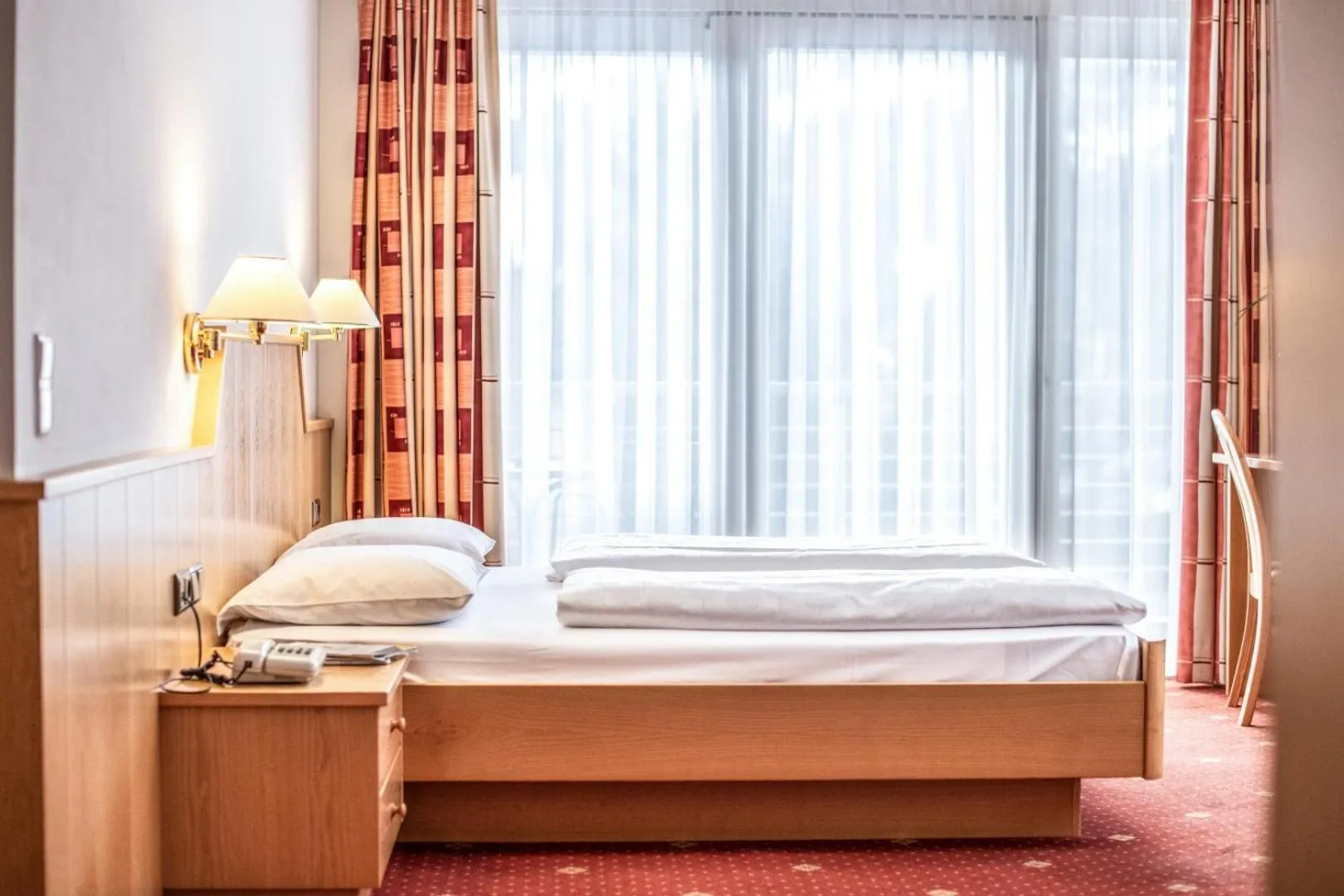 Photo of the whole room, Bed in Hotel Mondschein