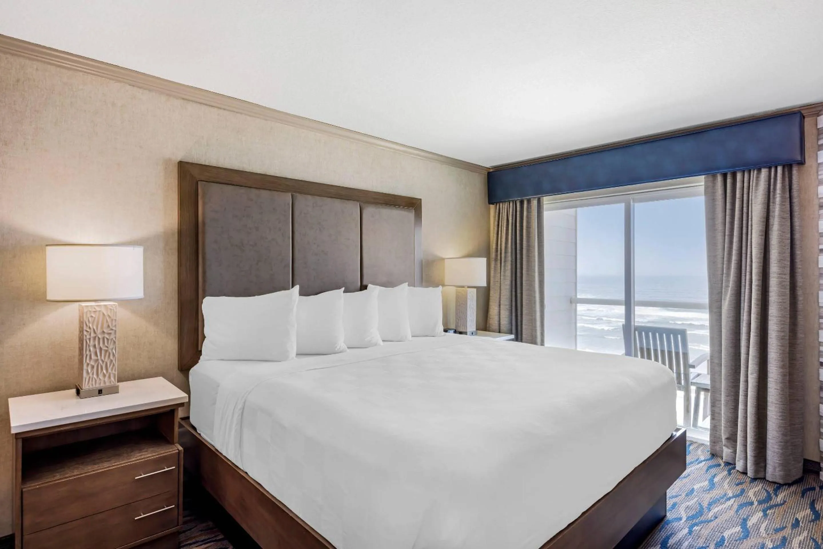 Bedroom, Bed in Elizabeth Oceanfront Suites, an Ascend Collection Hotel