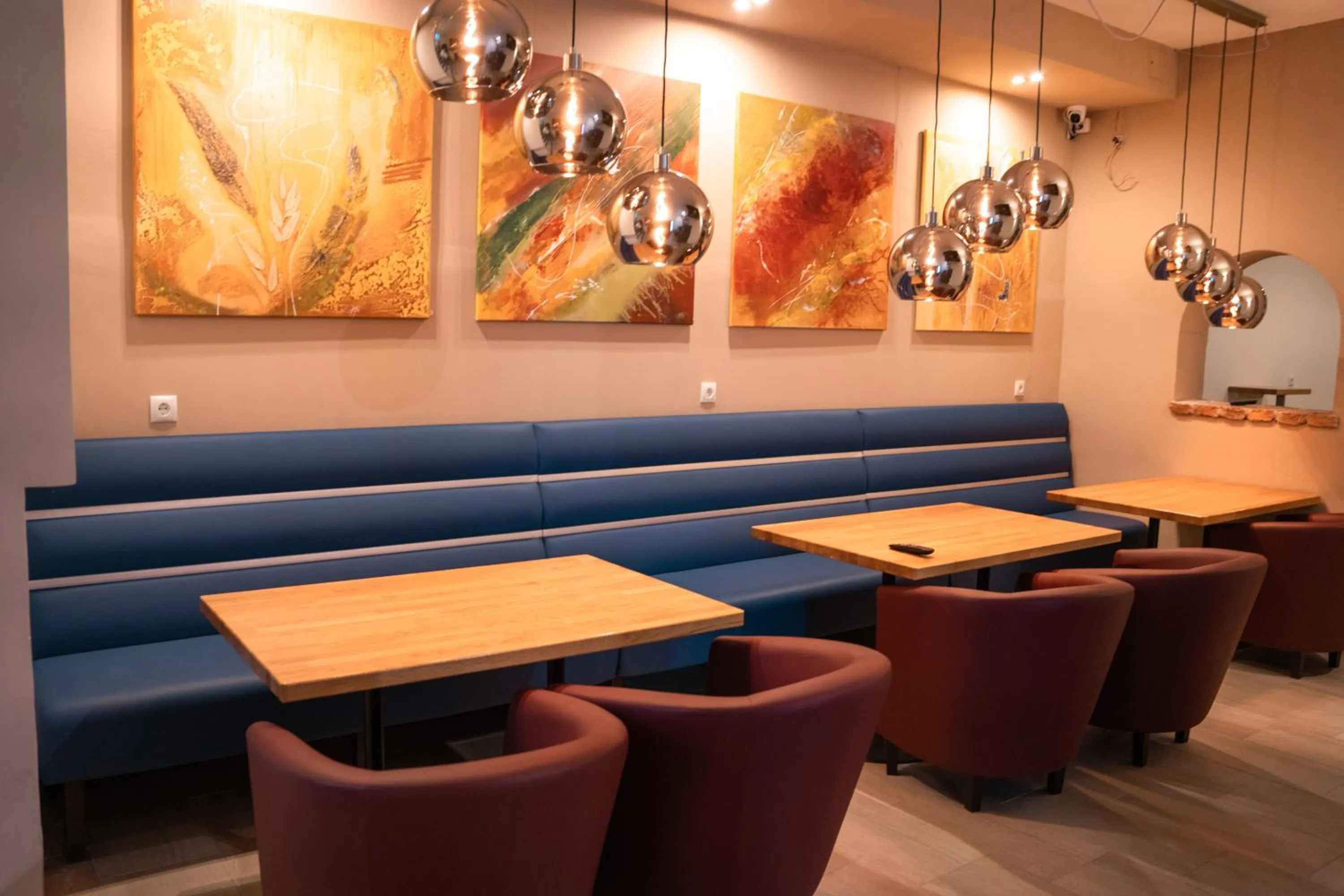 Communal lounge/ TV room in Boutique Hotel Erla