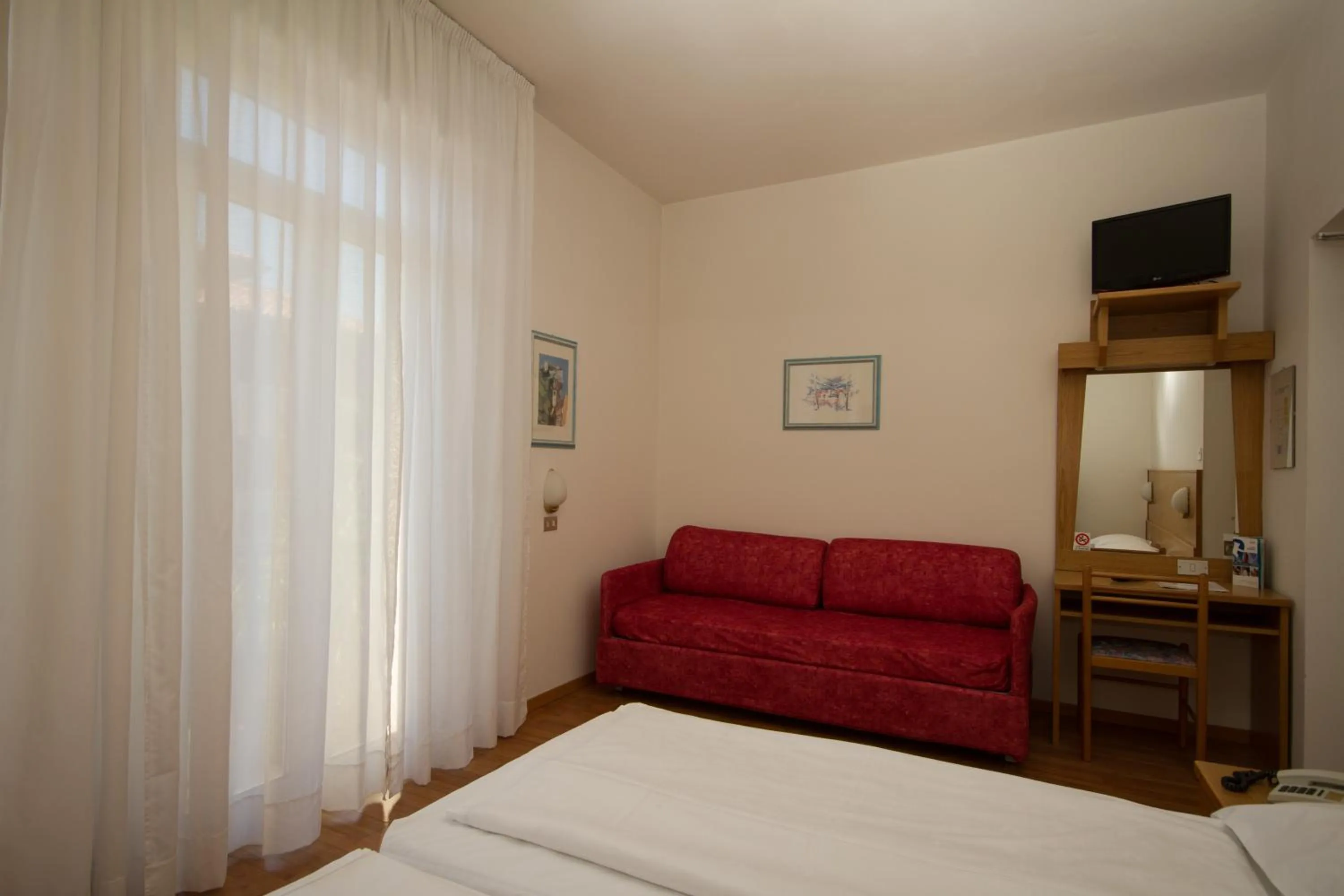 Bedroom in Villa Orchidea