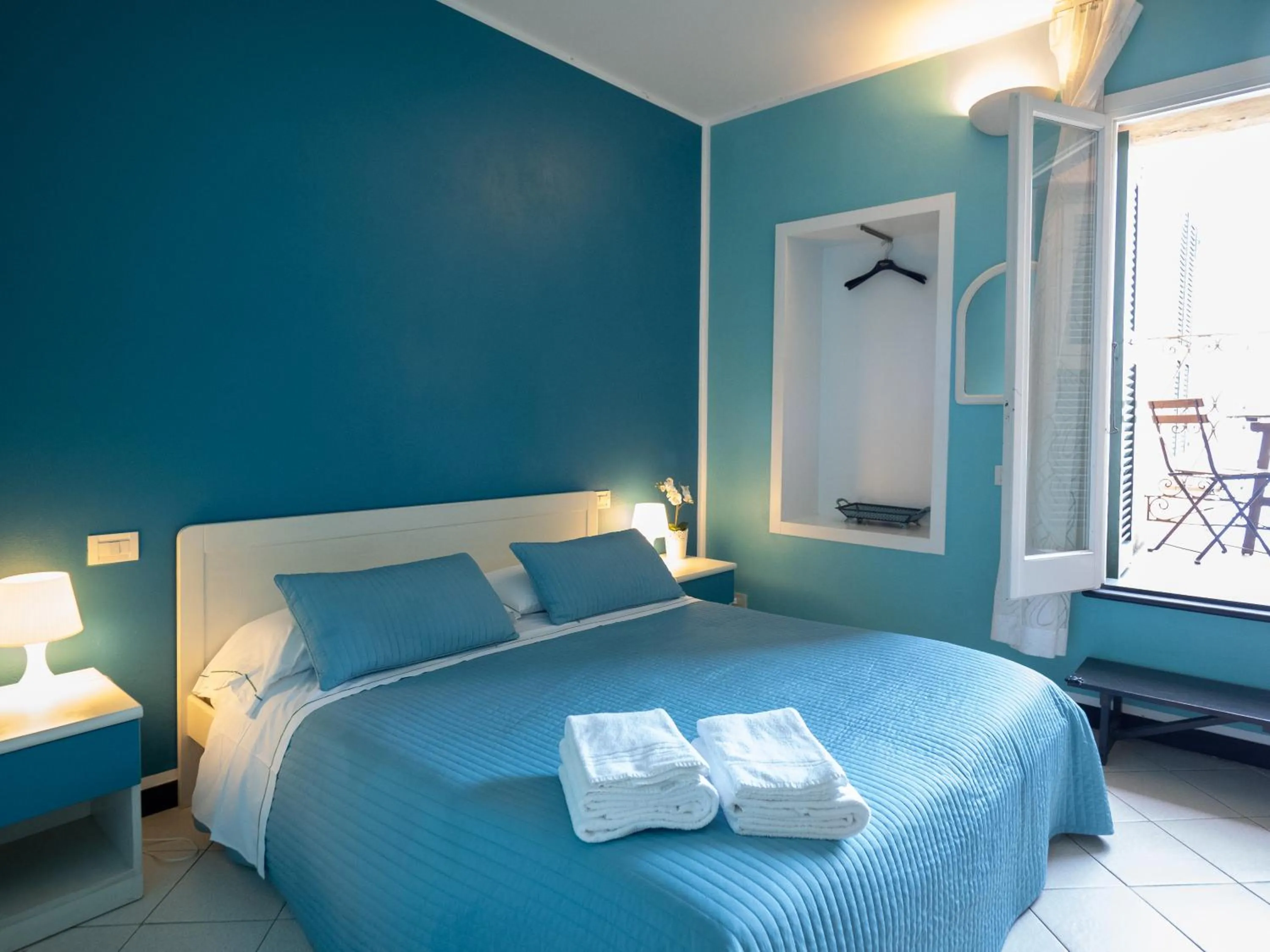 Bed in Ventegà Sea View Apartment with Balcony