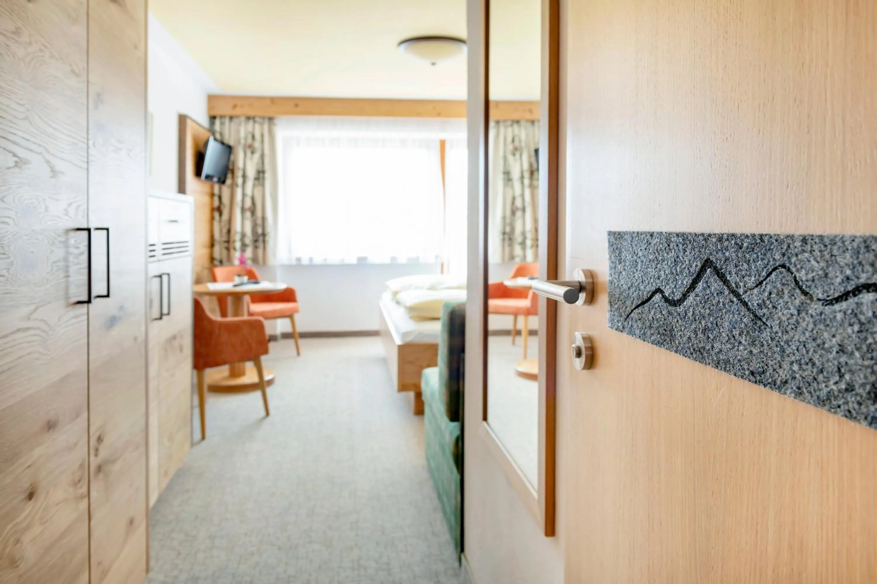 Photo of the whole room, Bed in Landhotel Tirolerhof - Wildschönau - PREMIUM Card im Sommer