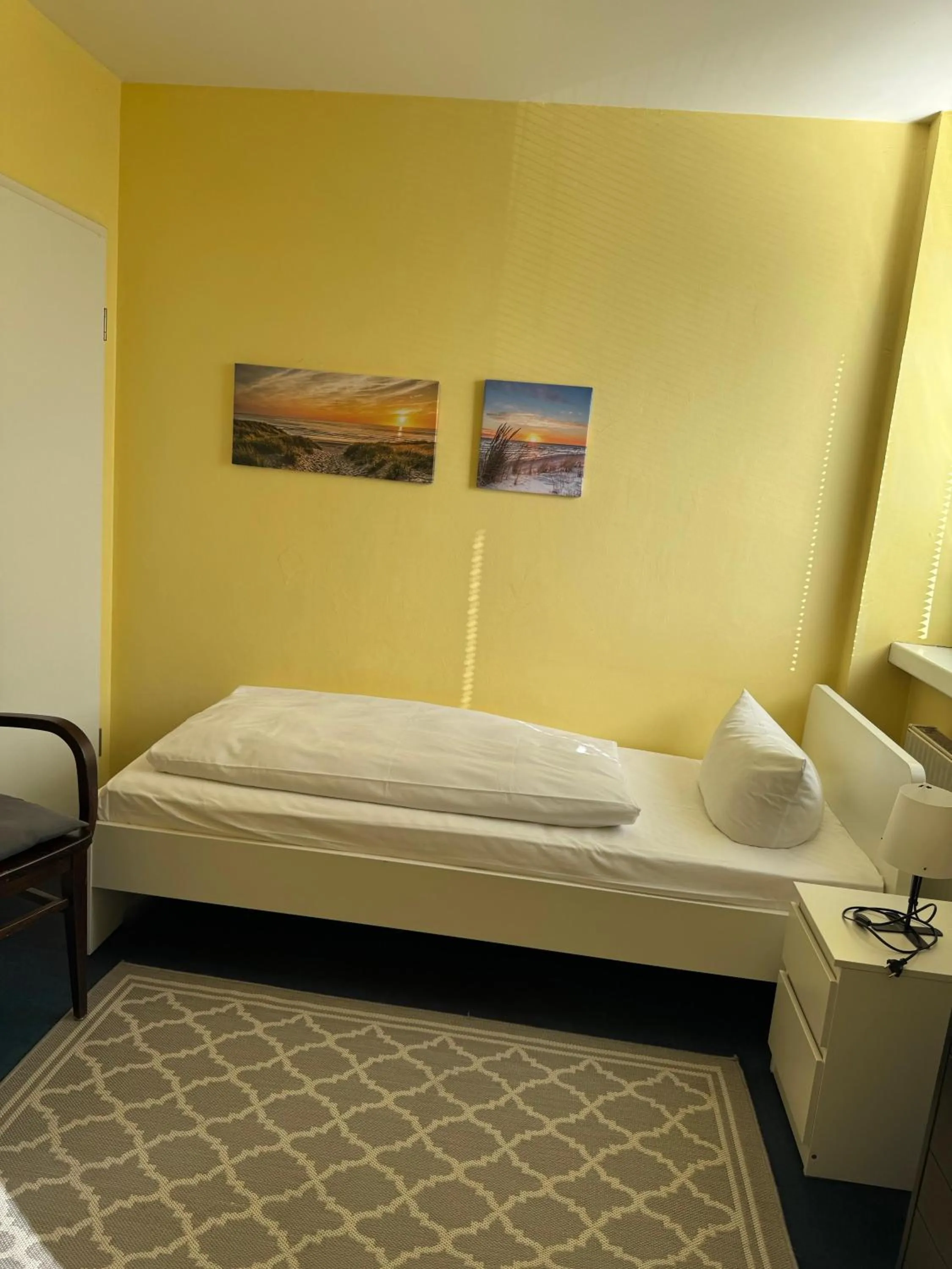 Bed in Hotel Schweriner Hof