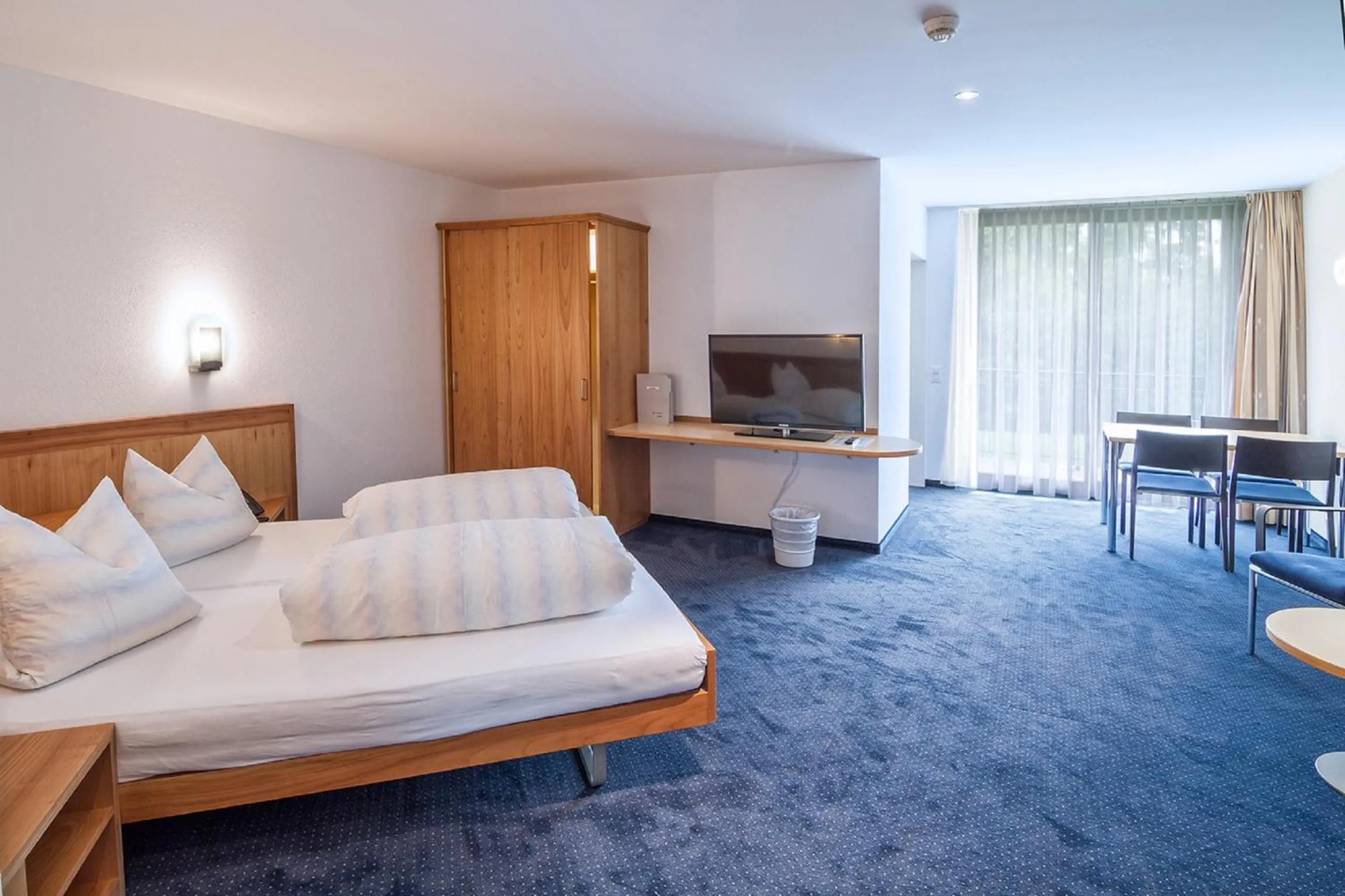 Photo of the whole room, Bed in Hotel Rössli Tufertschwil