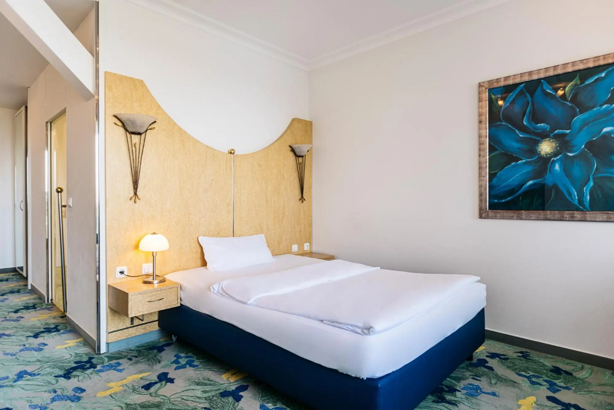 Bed in Vitalia Seehotel