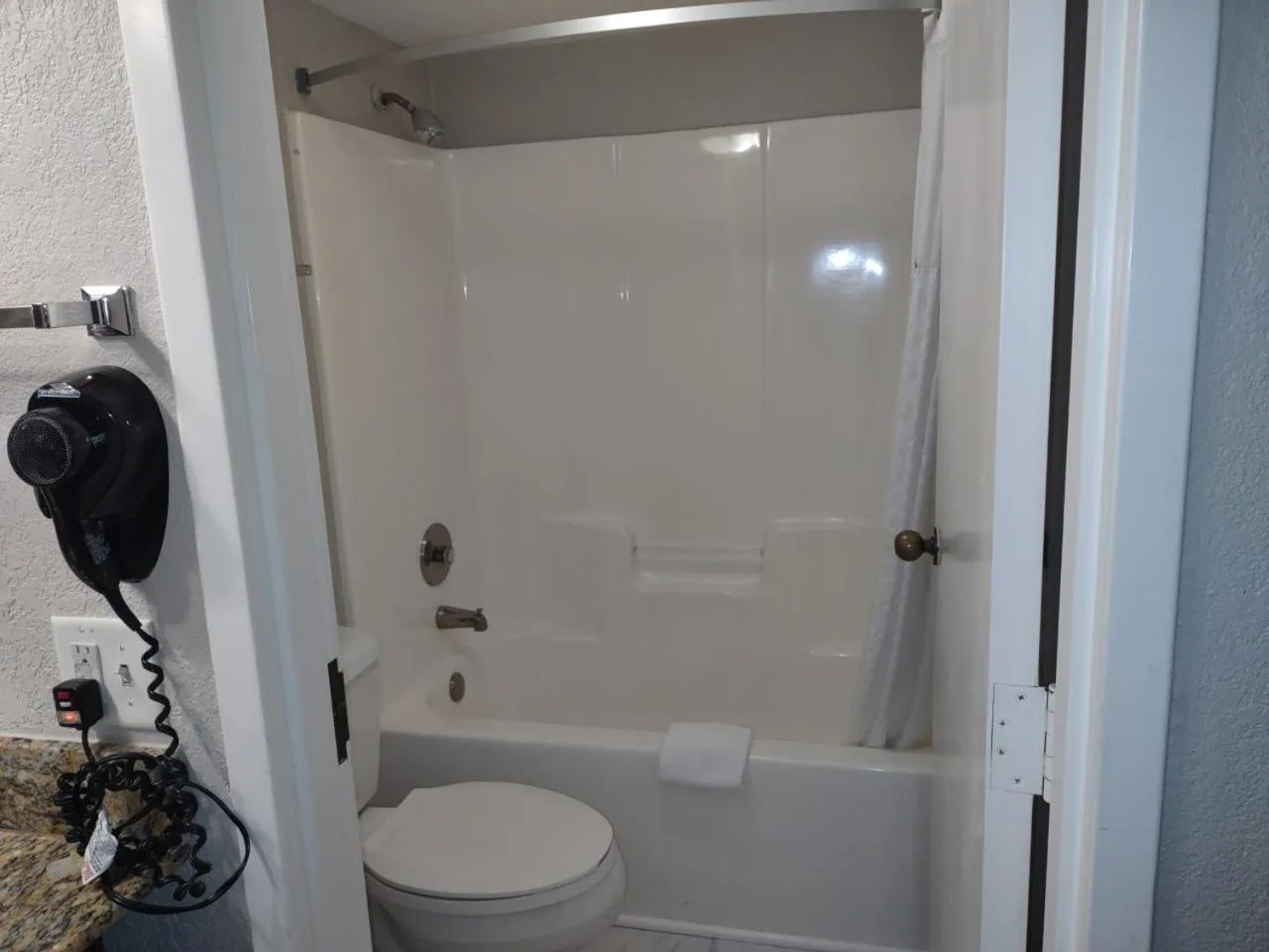 Bathroom in Days Inn by Wyndham Port Charlotte Town Center