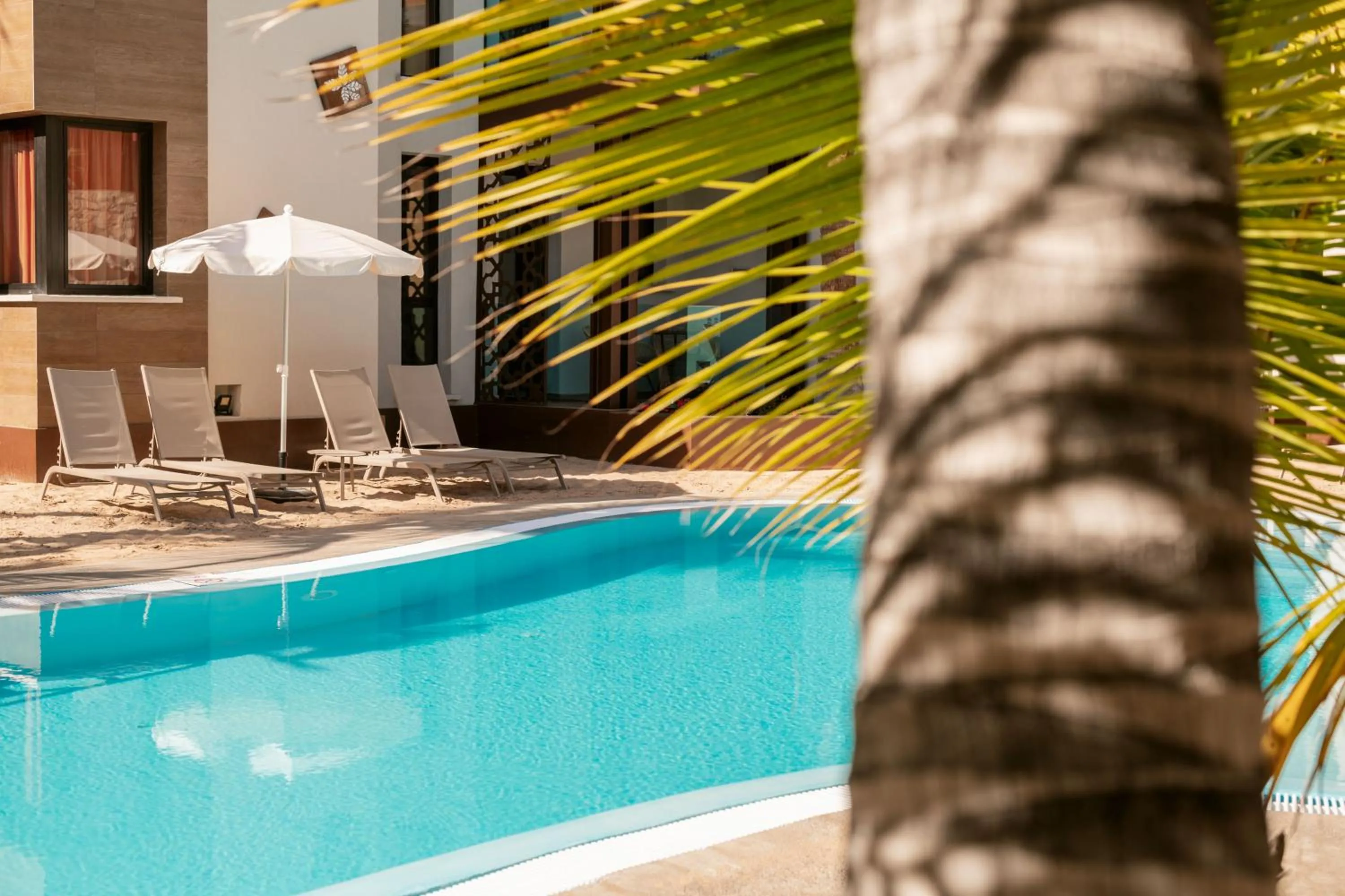 Swimming pool in Alhambra Boutique Apartments by PMC Resorts