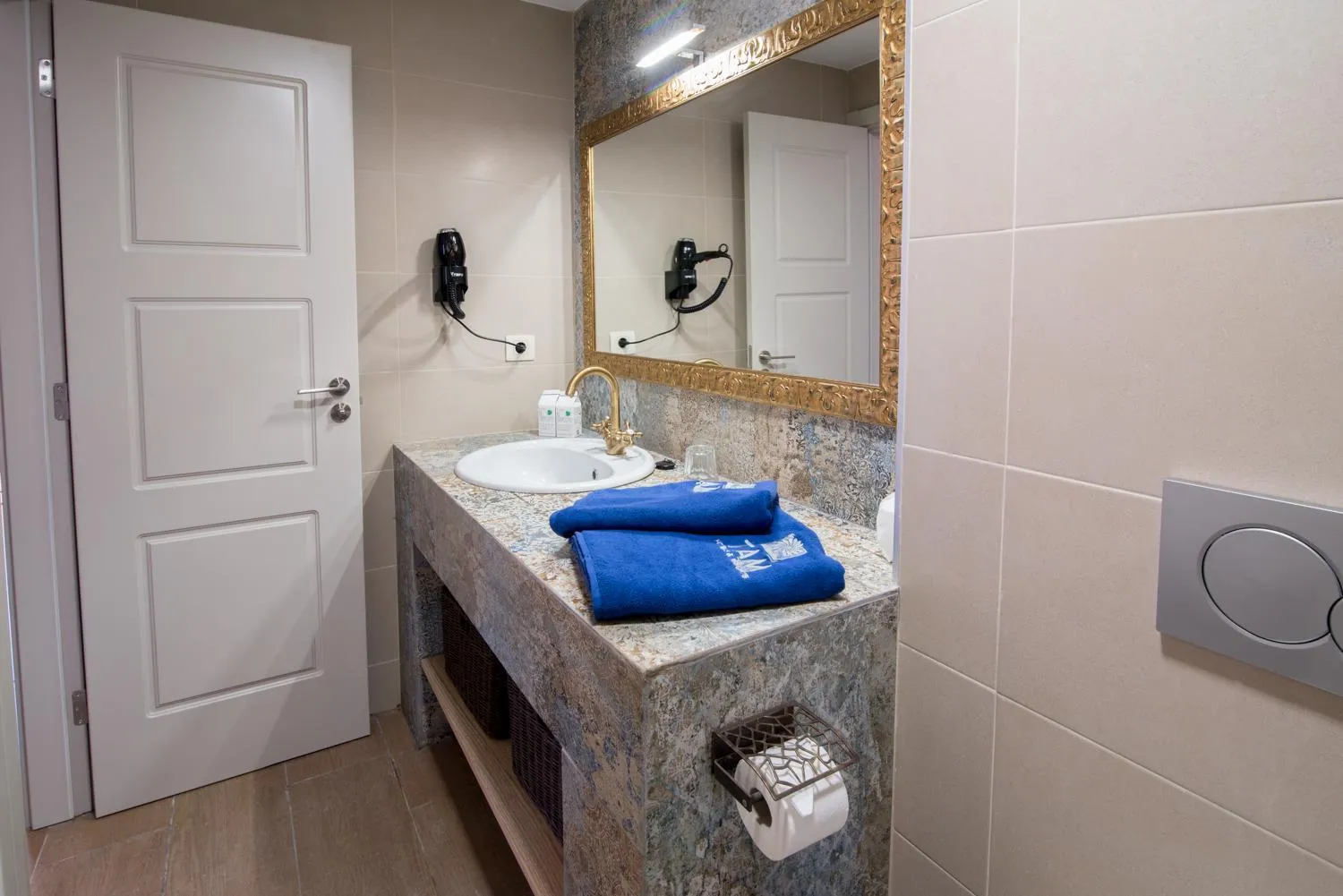 Bathroom in Alhambra Boutique Apartments by PMC Resorts