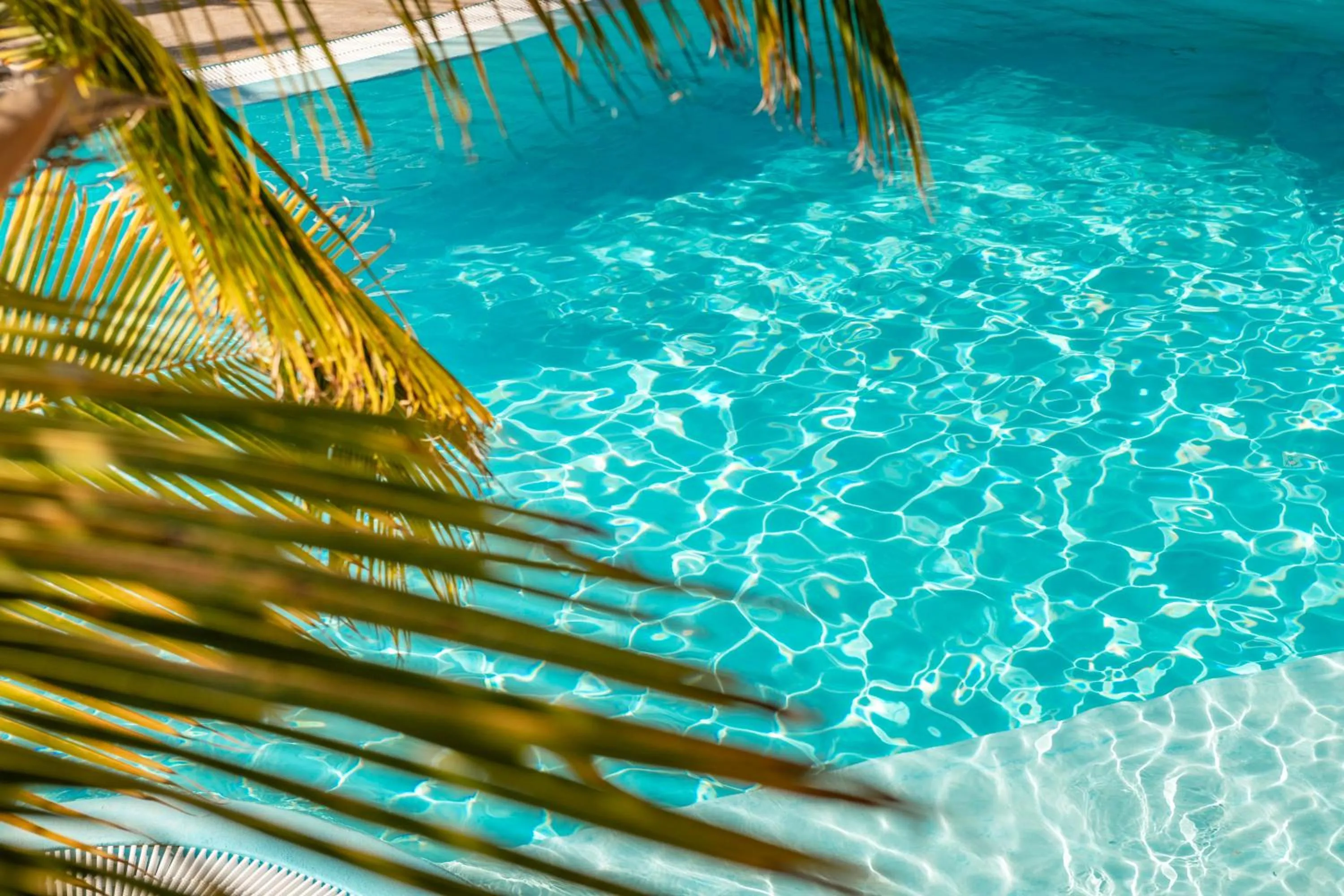 Swimming pool in Alhambra Boutique Apartments by PMC Resorts