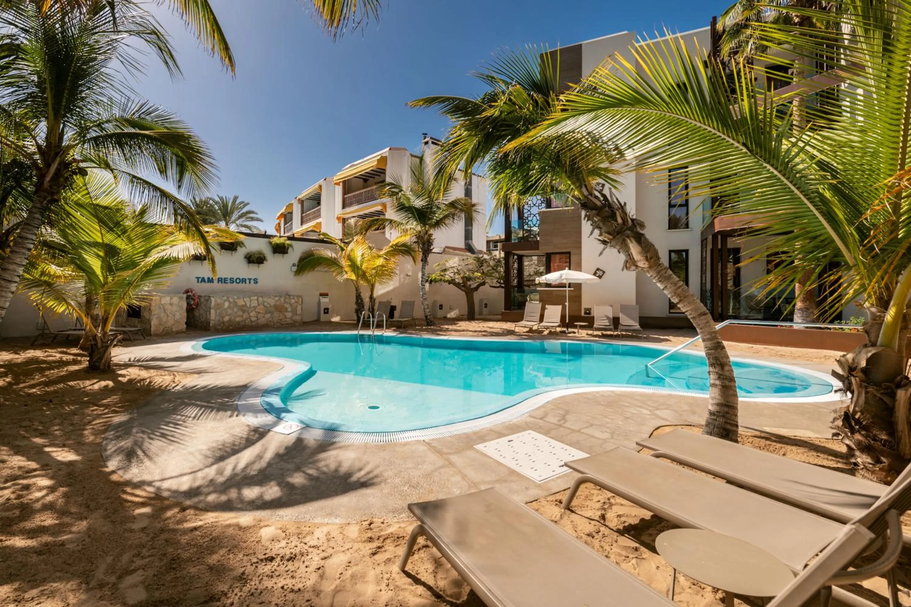 Swimming pool in Alhambra Boutique Apartments by PMC Resorts