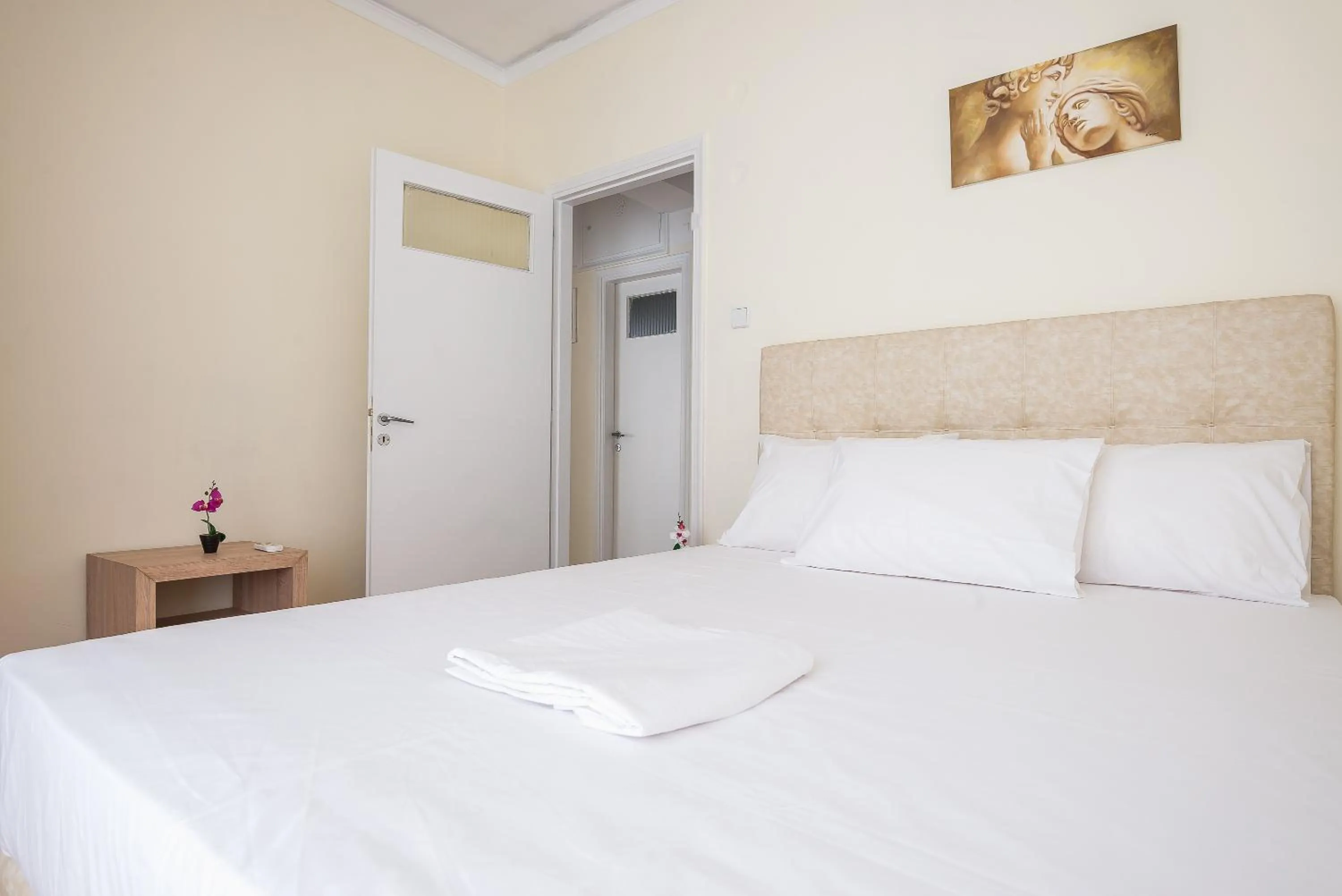 Bed in Acropolis View Paradise Apartments