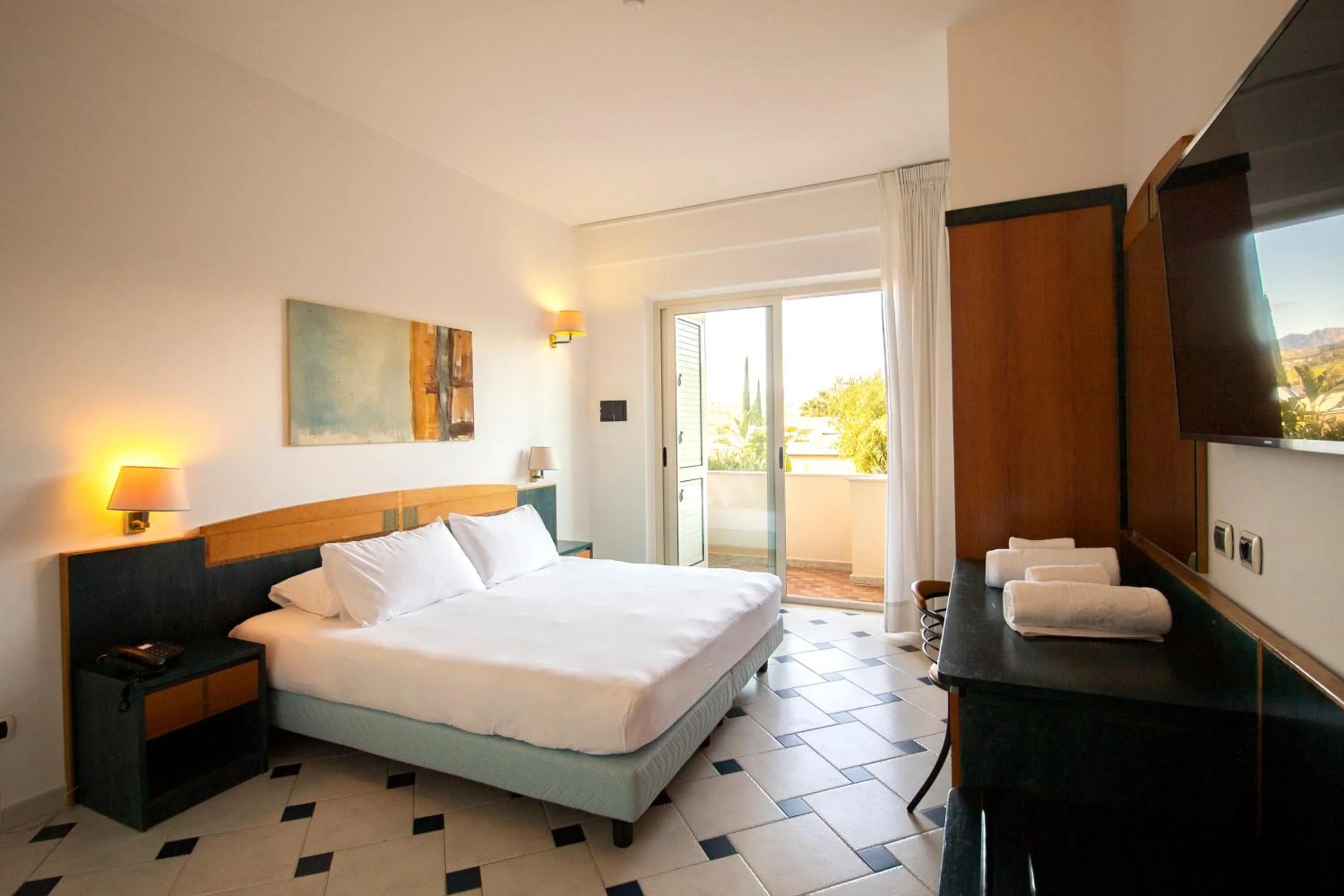 Bed in Grand Hotel President