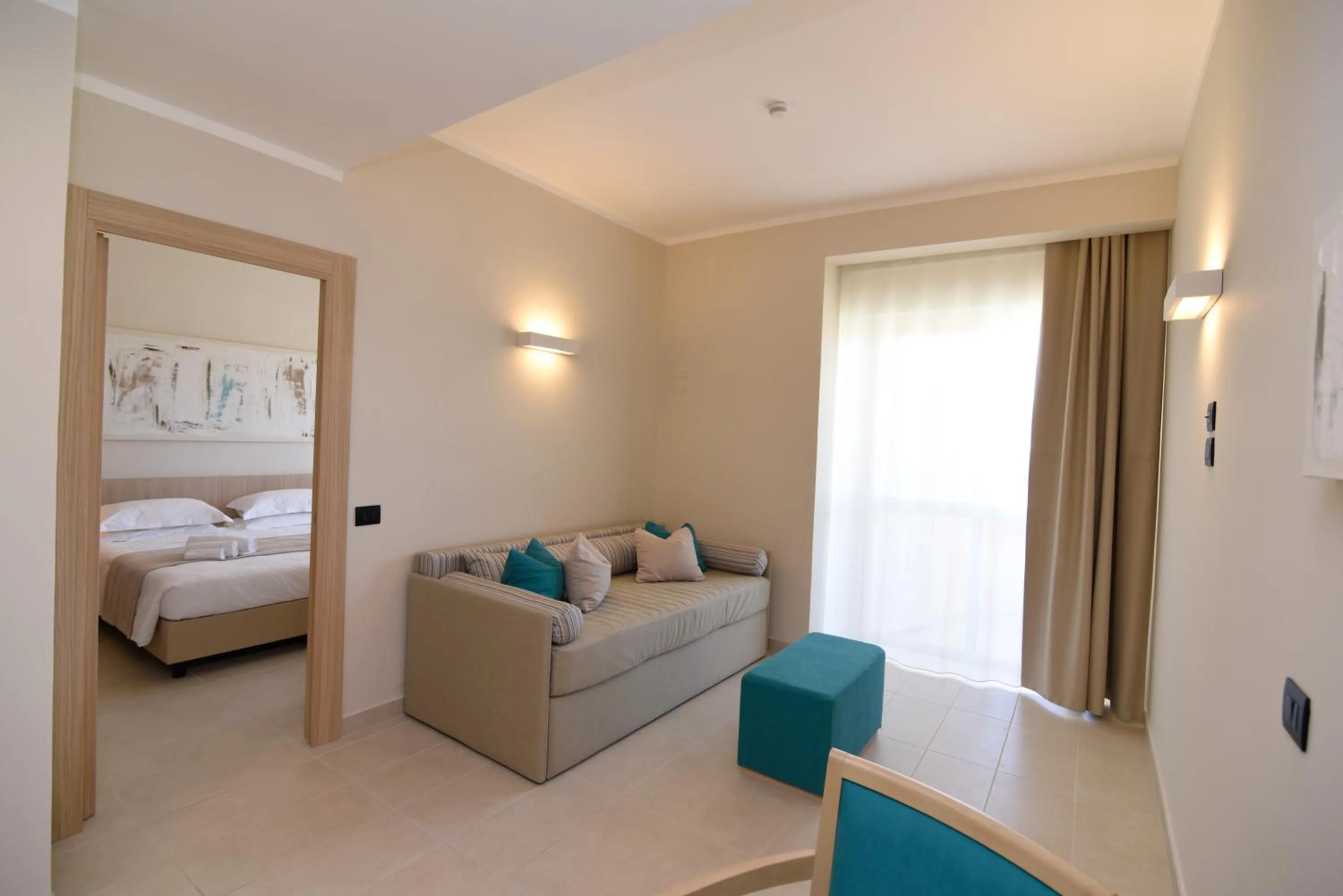 Living room, Bed in Grand Hotel President