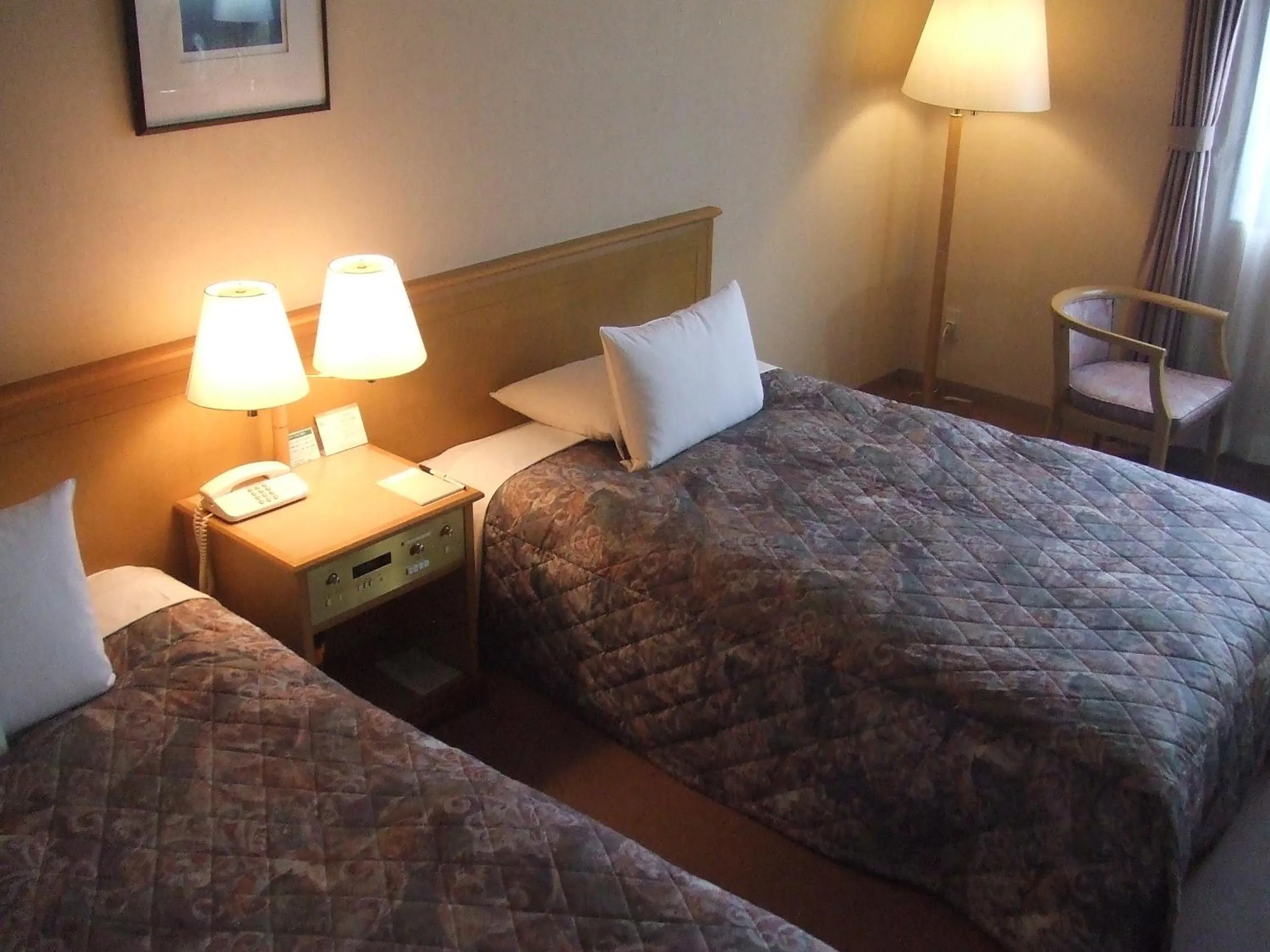 Bedroom, Bed in Fukuno Town Hotel A・Mieux