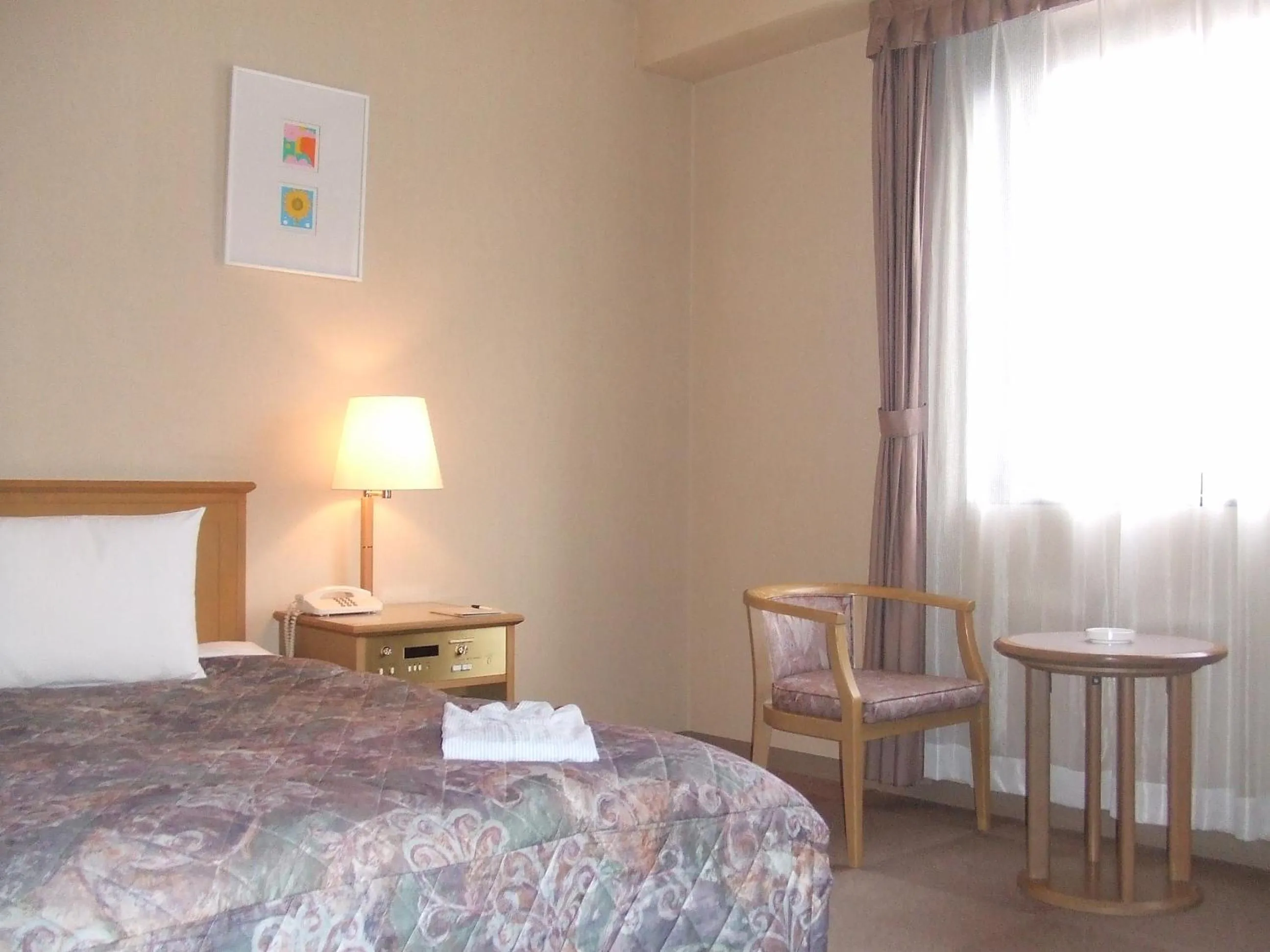 Bedroom, Bed in Fukuno Town Hotel A・Mieux