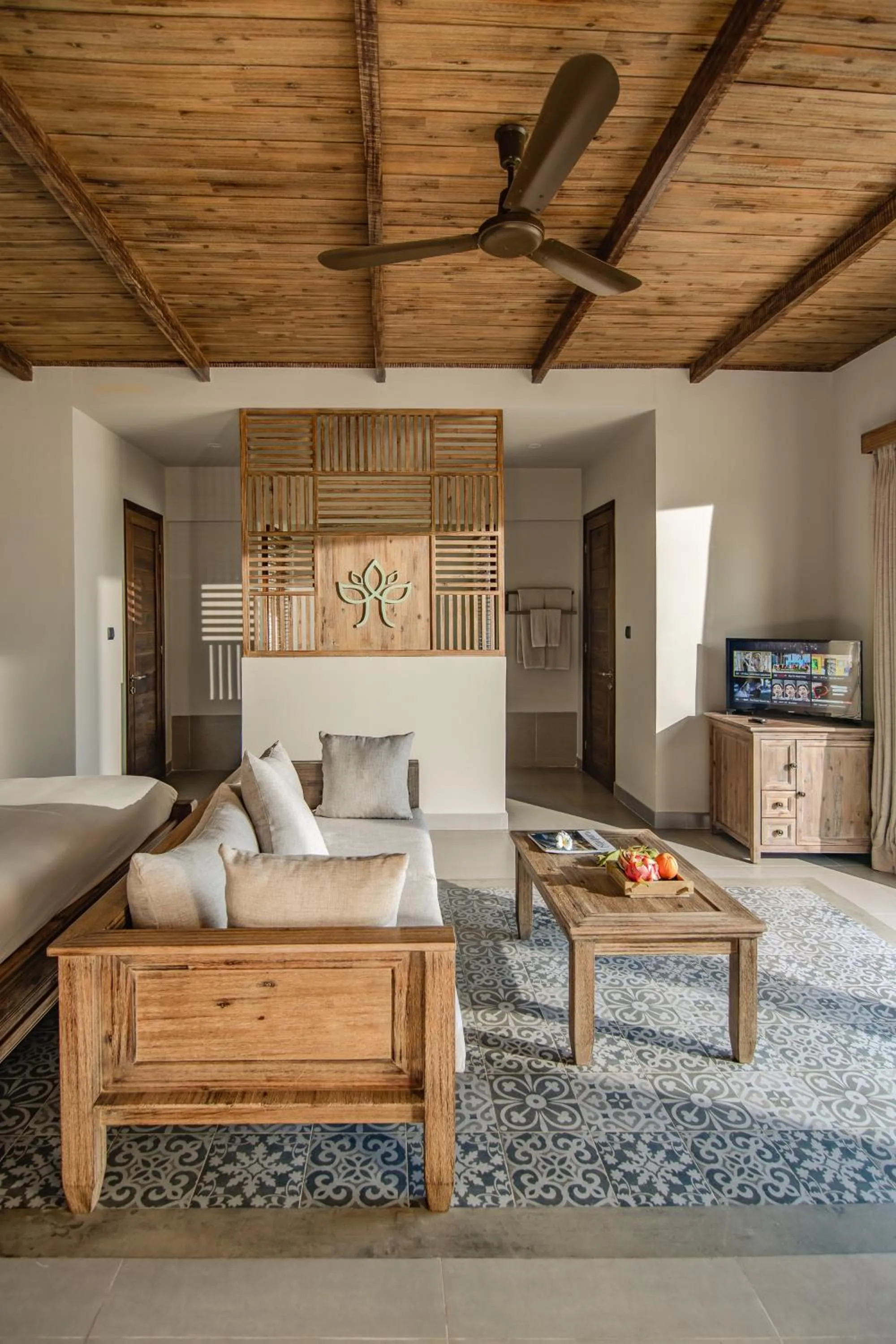 Living room, Bed in Crown Retreat Quy Nhon Resort