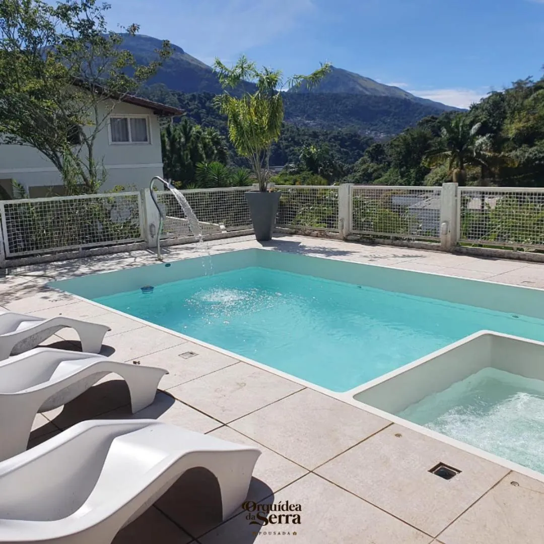 Swimming pool in Pousada Orquidea da Serra