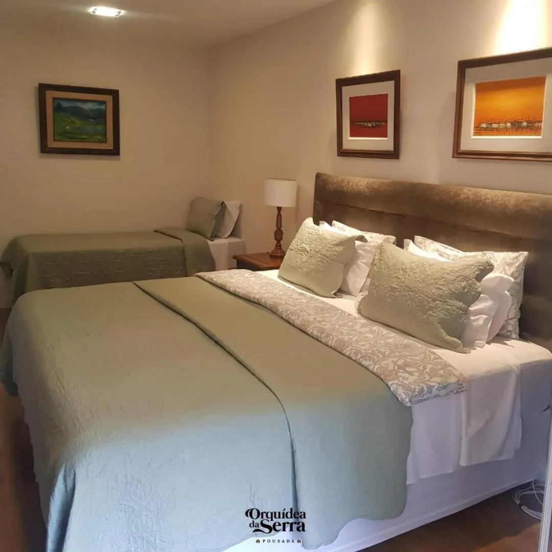 Bed in Pousada Orquidea da Serra