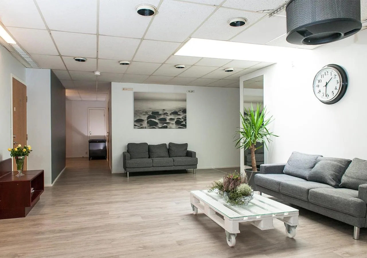 Communal lounge/ TV room in Hotelli & Ravintola Martinhovi