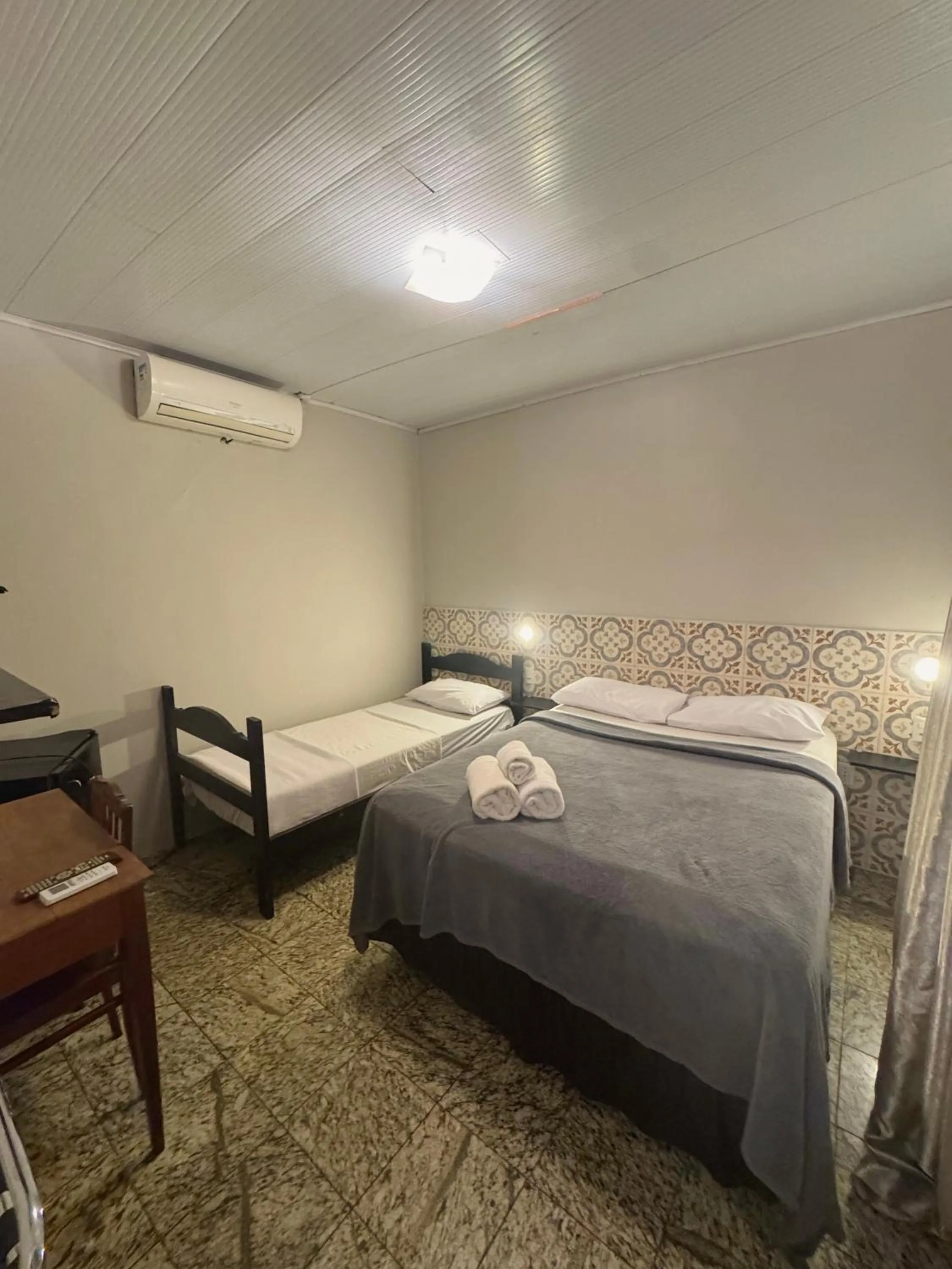 Bed in HMG Rio Suítes