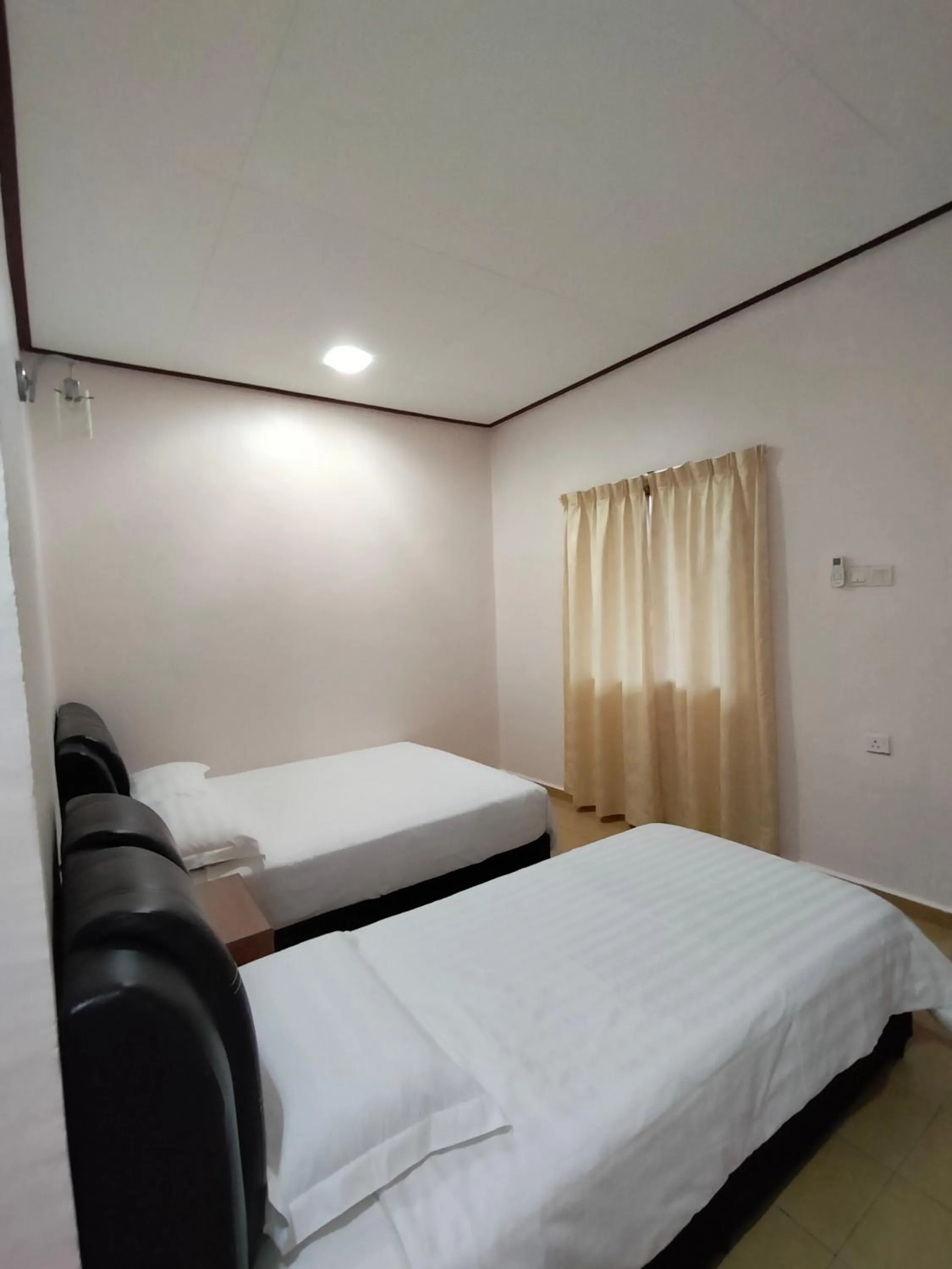 Bed in Restu Chalet Tioman