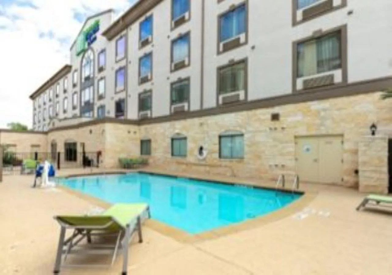 Swimming pool in Holiday Inn Express & Suites Houston South - Near Pearland by IHG