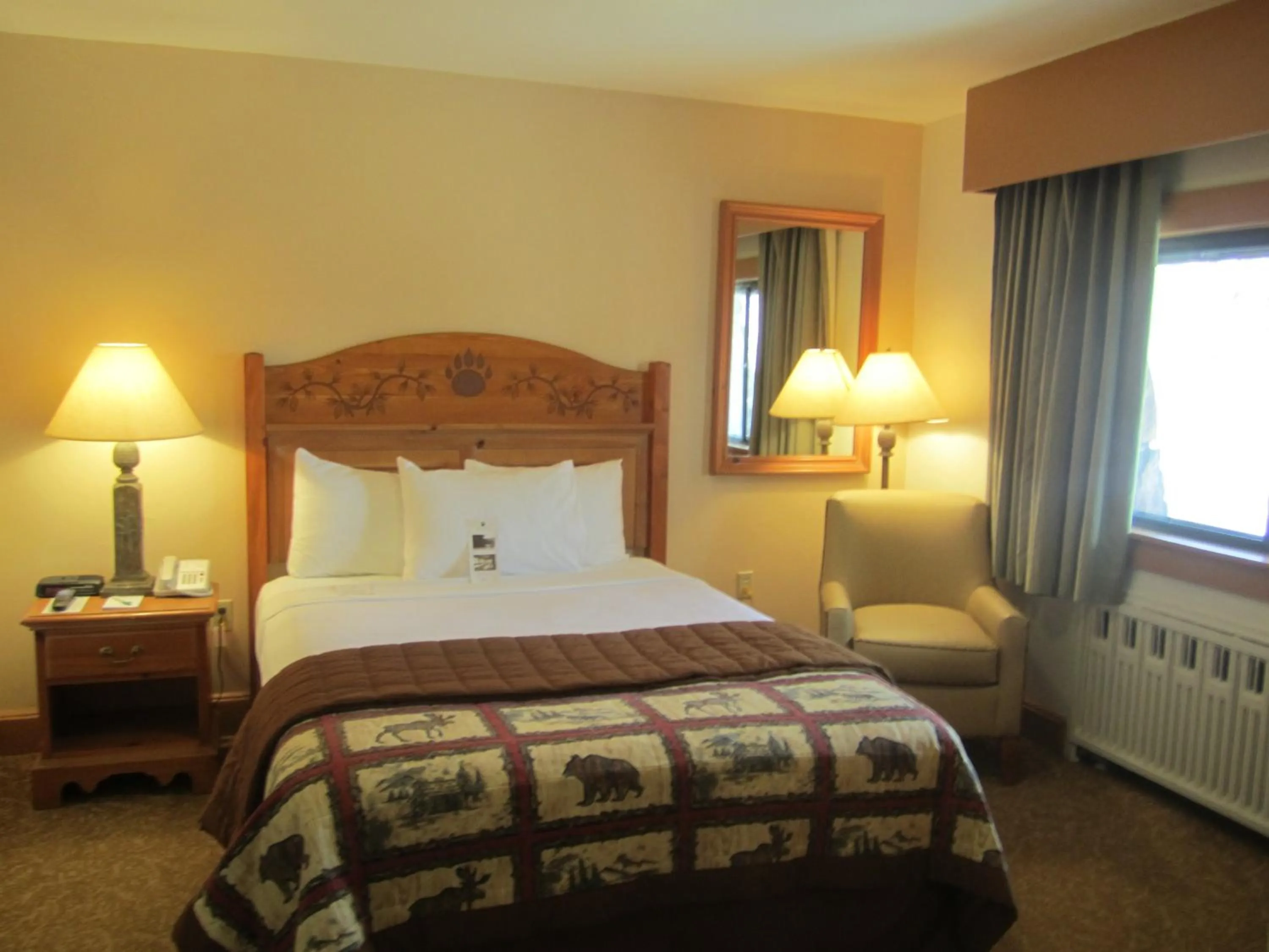 Shower, Bed in Overlook Lodge and Stone Cottages at Bear Mountain