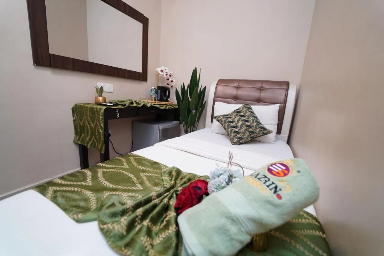 Bed in Ghazrin's Classic Hotel JB