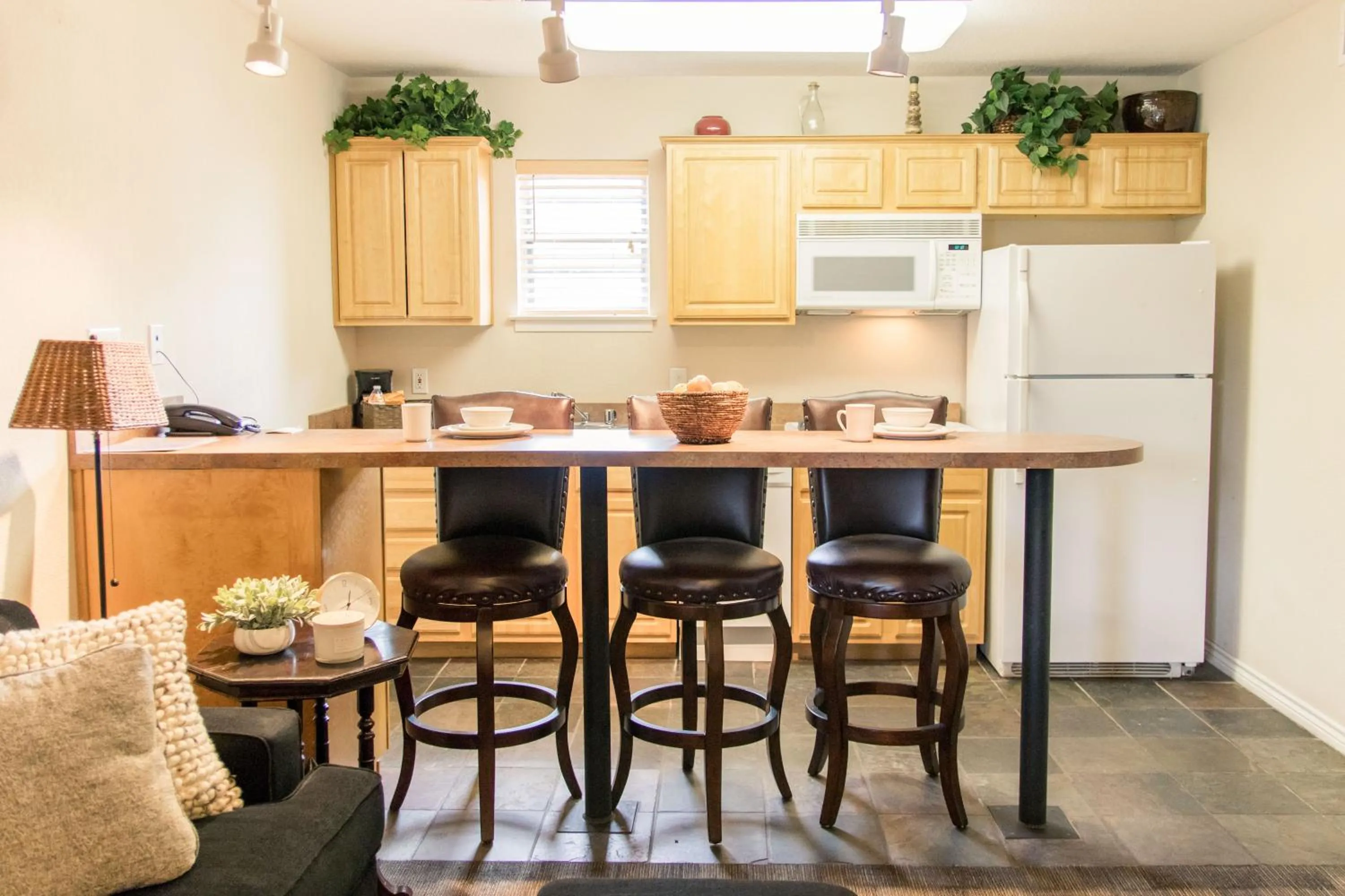 Kitchen or kitchenette in Vineyard Court Designer Suites Hotel