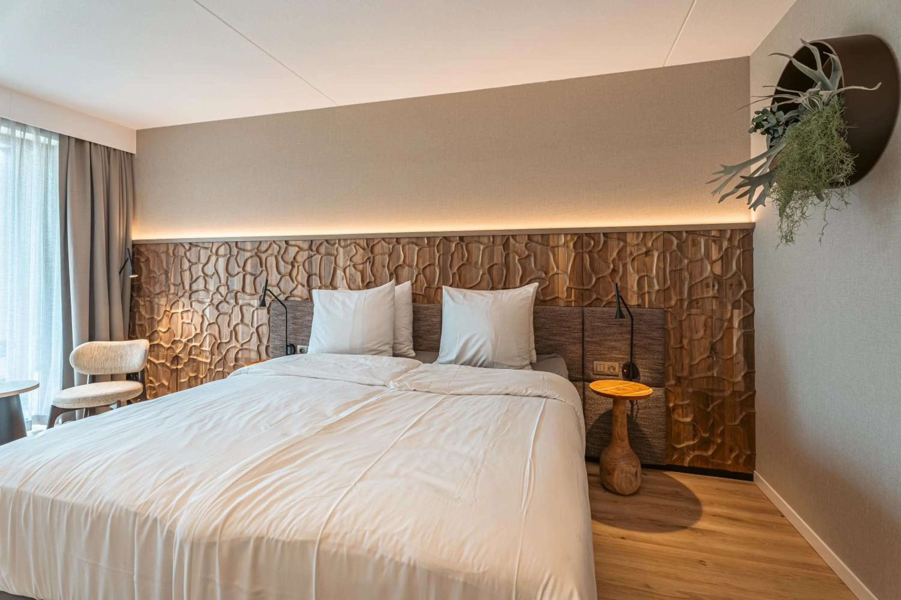 Bed in Strandhotel Duinoord