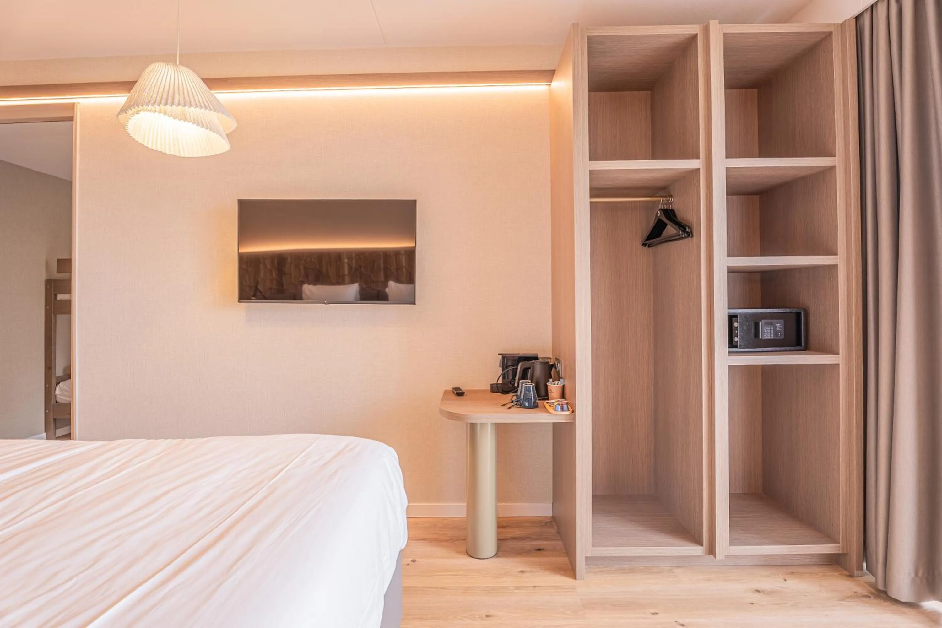 Bed in Strandhotel Duinoord