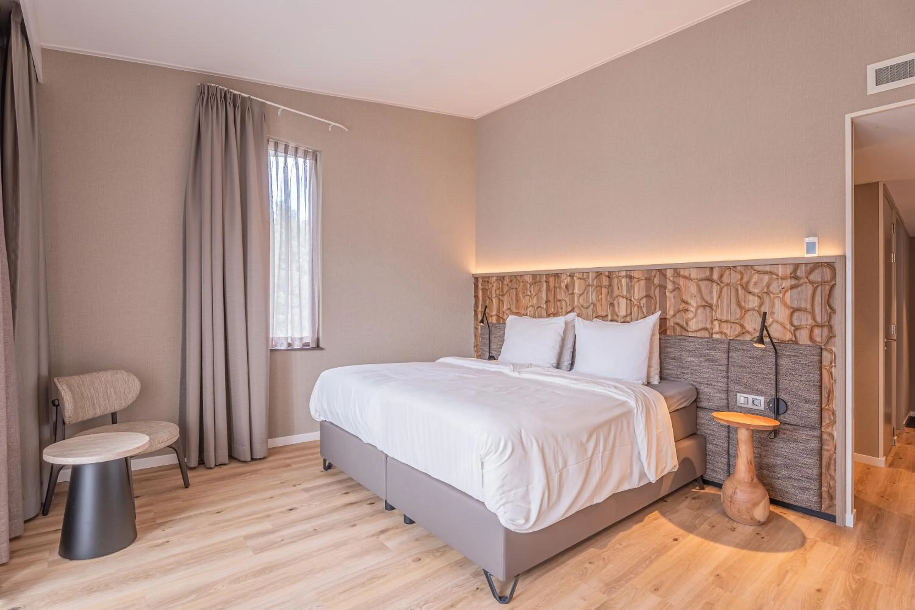 Bed in Strandhotel Duinoord