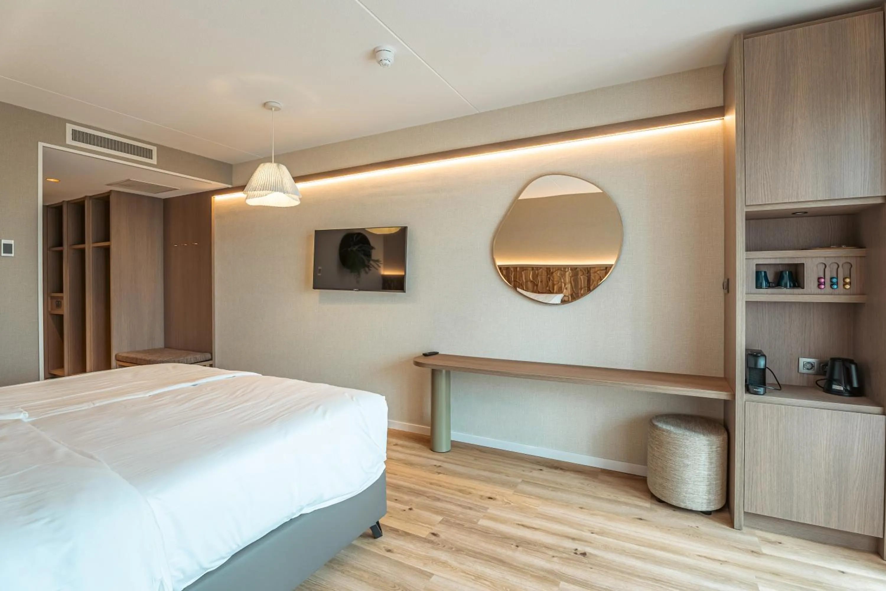 Bed in Strandhotel Duinoord