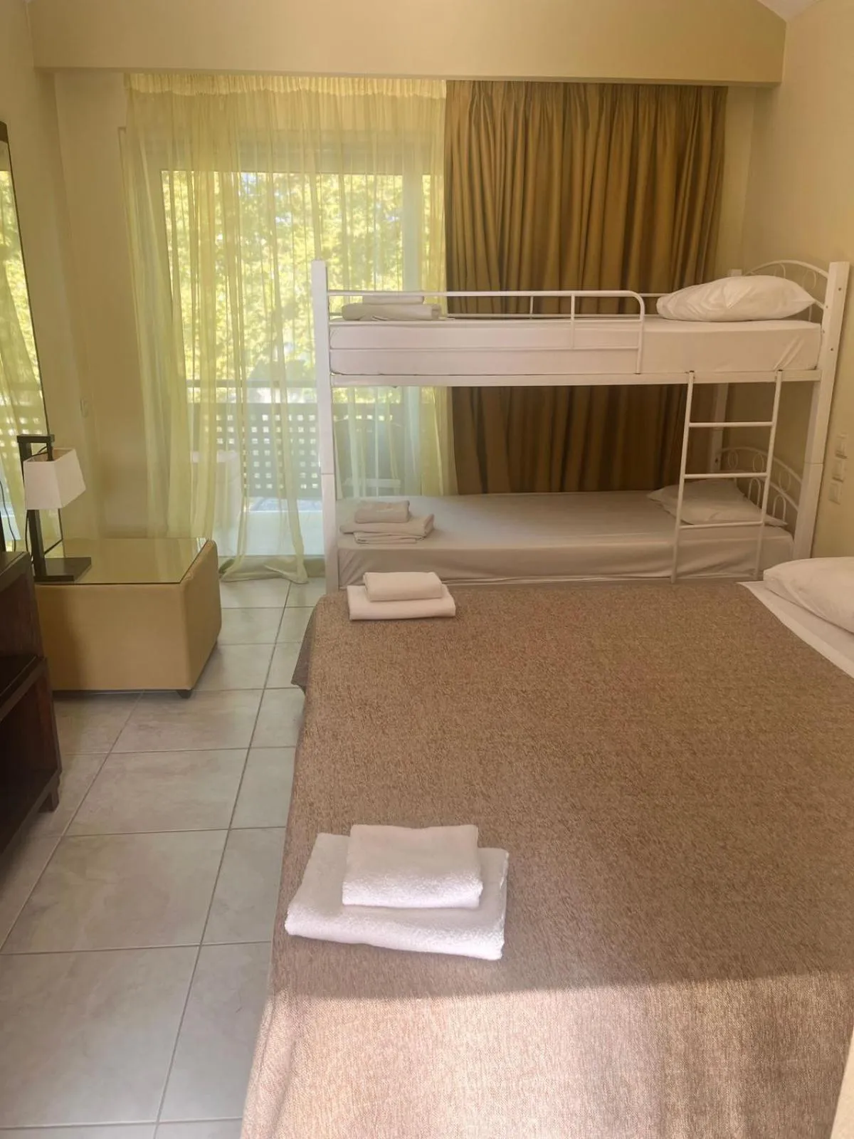 Bed in Olympian Bay Grand Resort