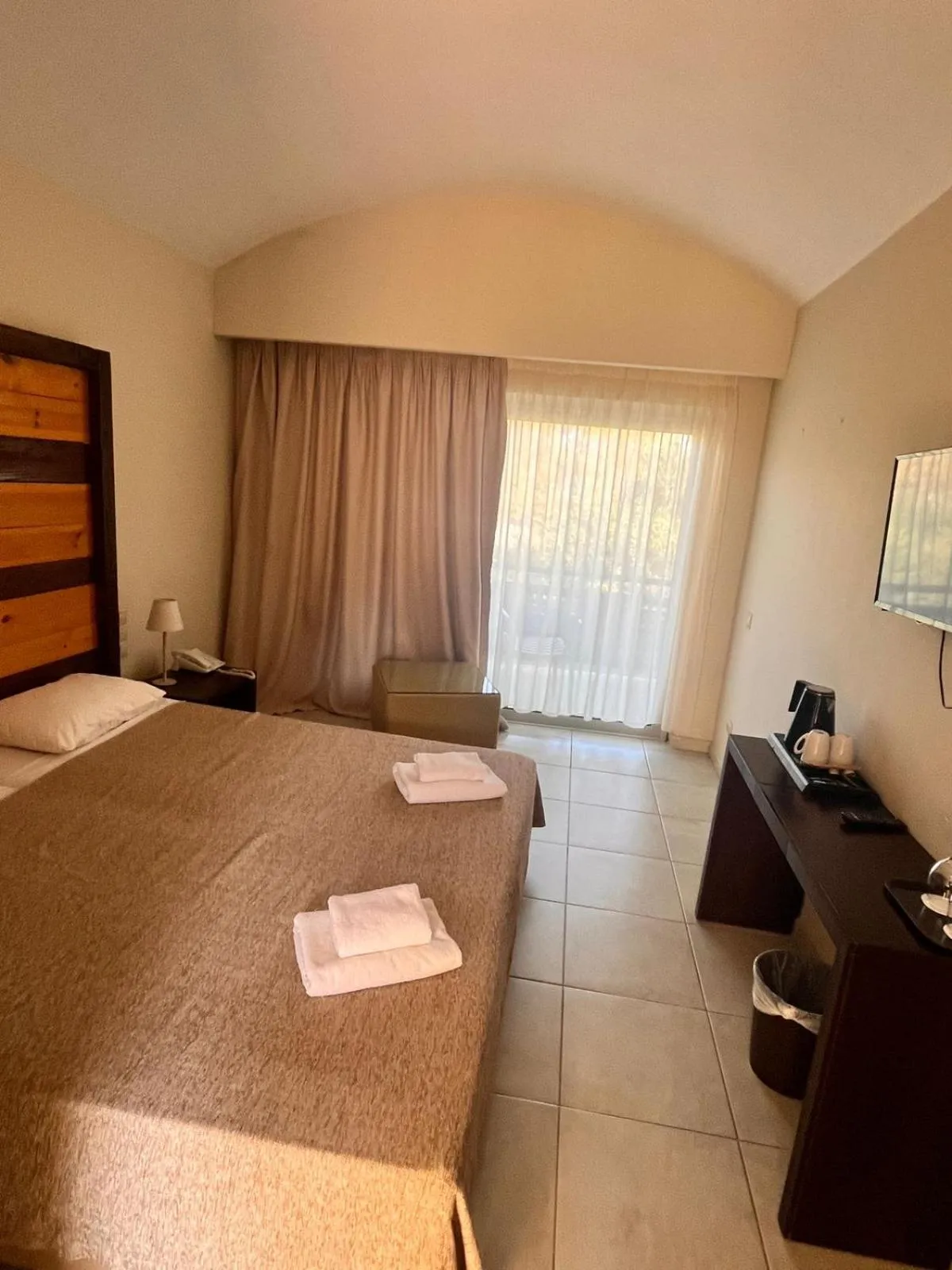 Bed in Olympian Bay Grand Resort