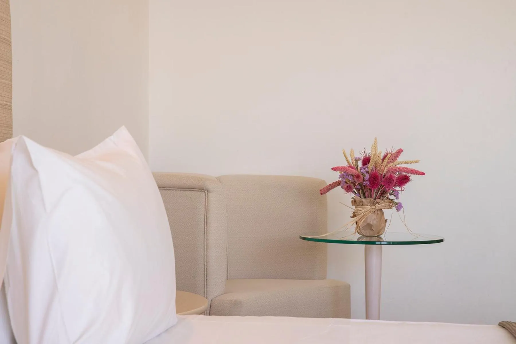 Bed in Olympian Bay Grand Resort